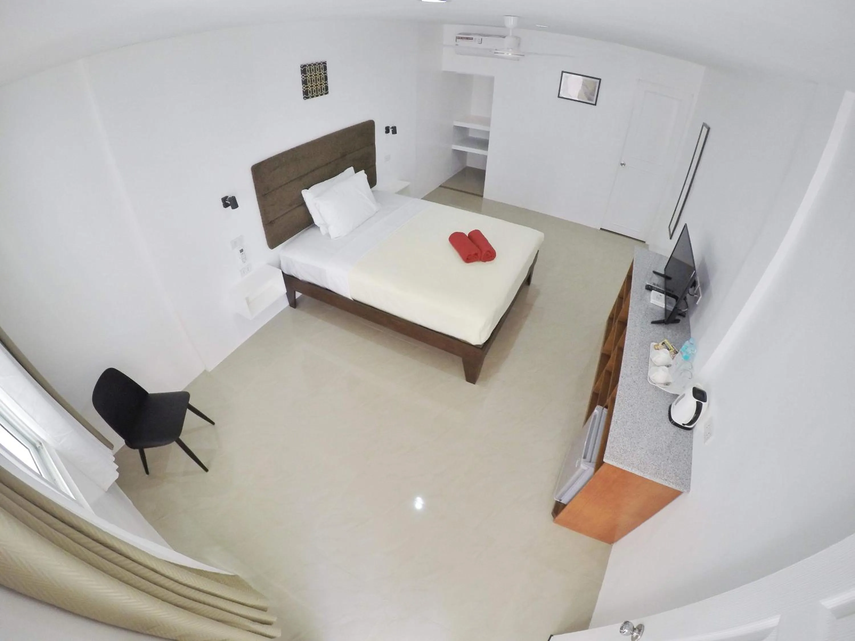 Bed in Heartland Hotel Serviced Rooms & Apartments.