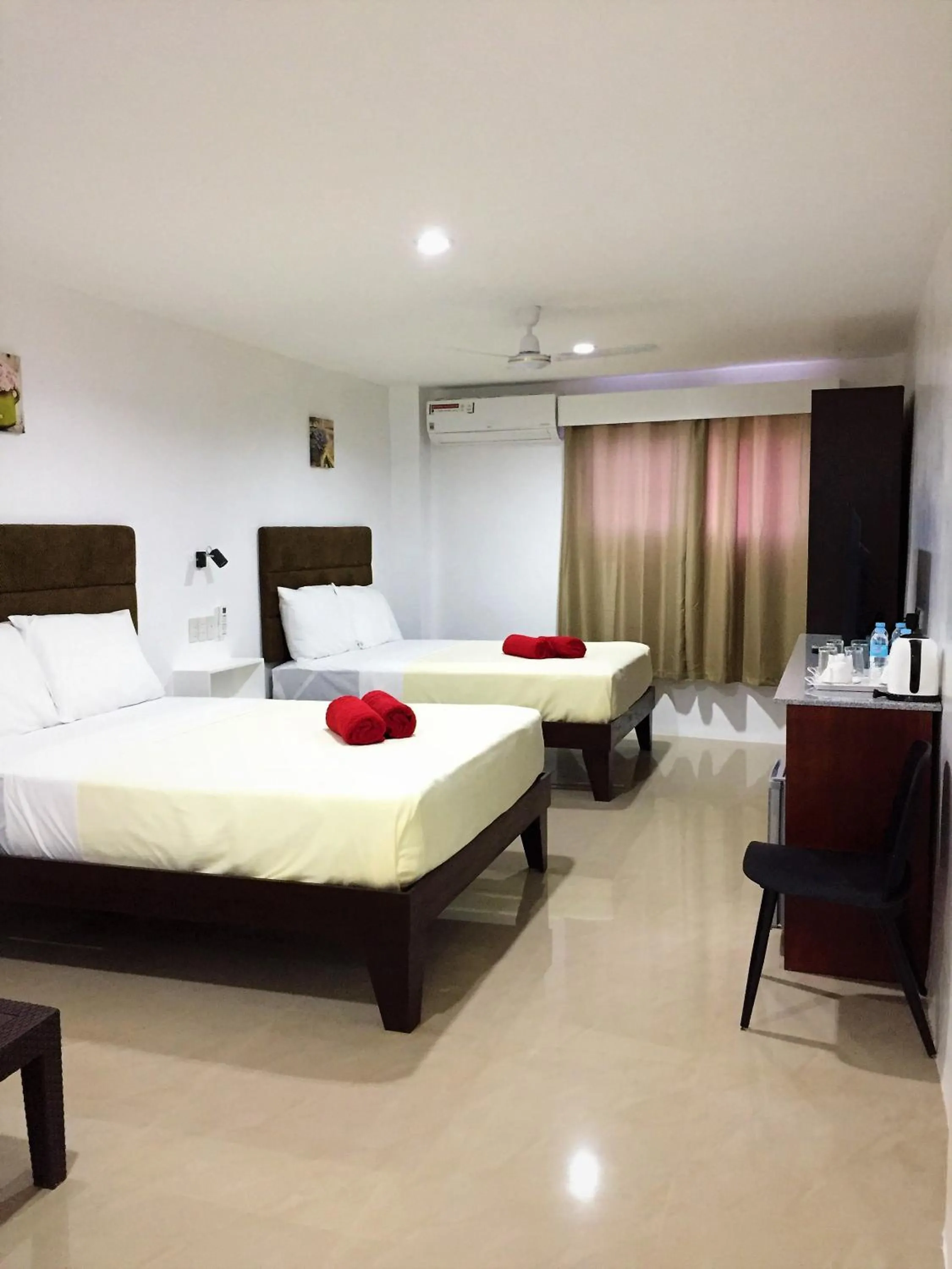Bed in Heartland Hotel Serviced Rooms & Apartments.