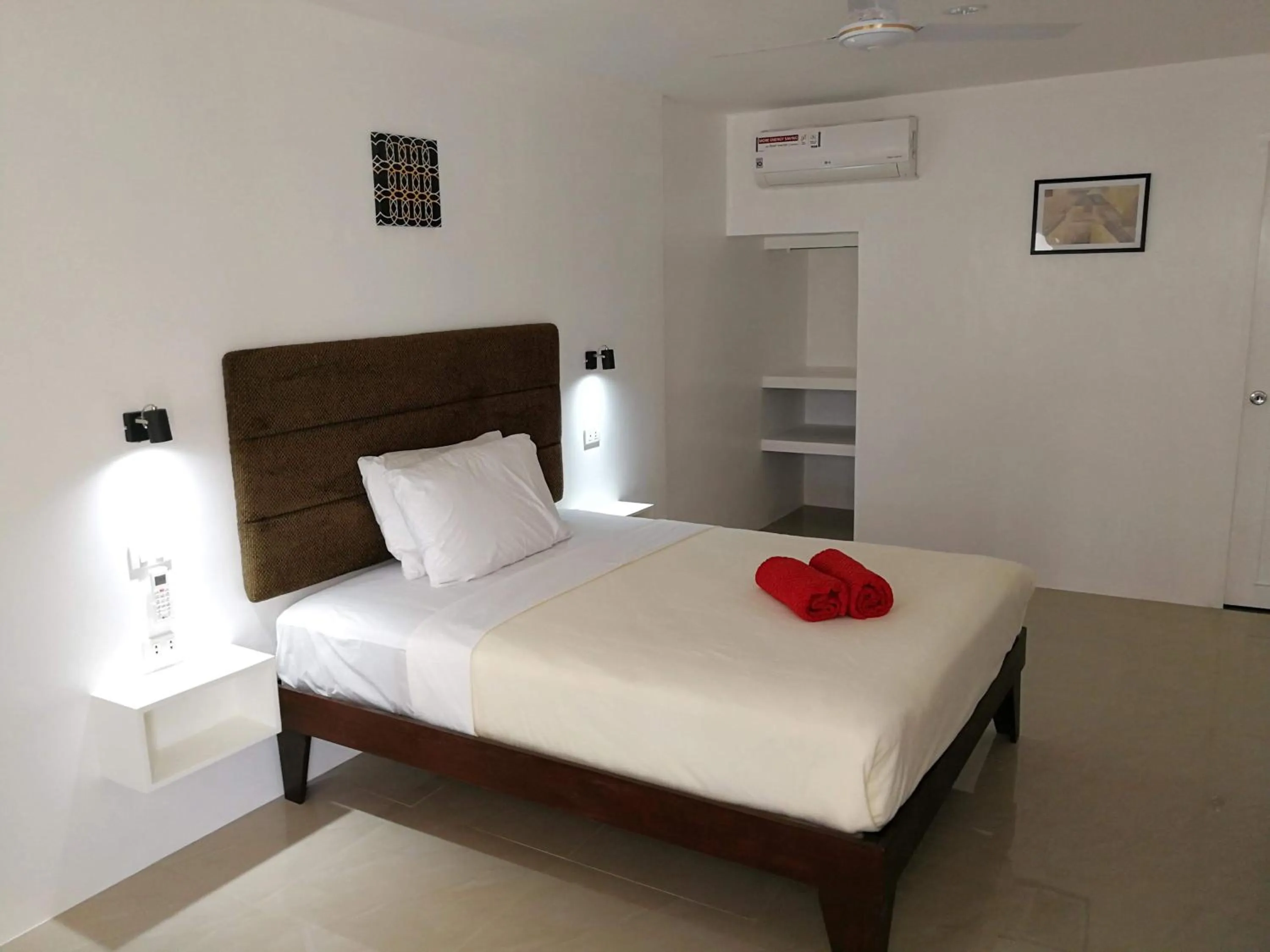 Bed in Heartland Hotel Serviced Rooms & Apartments.