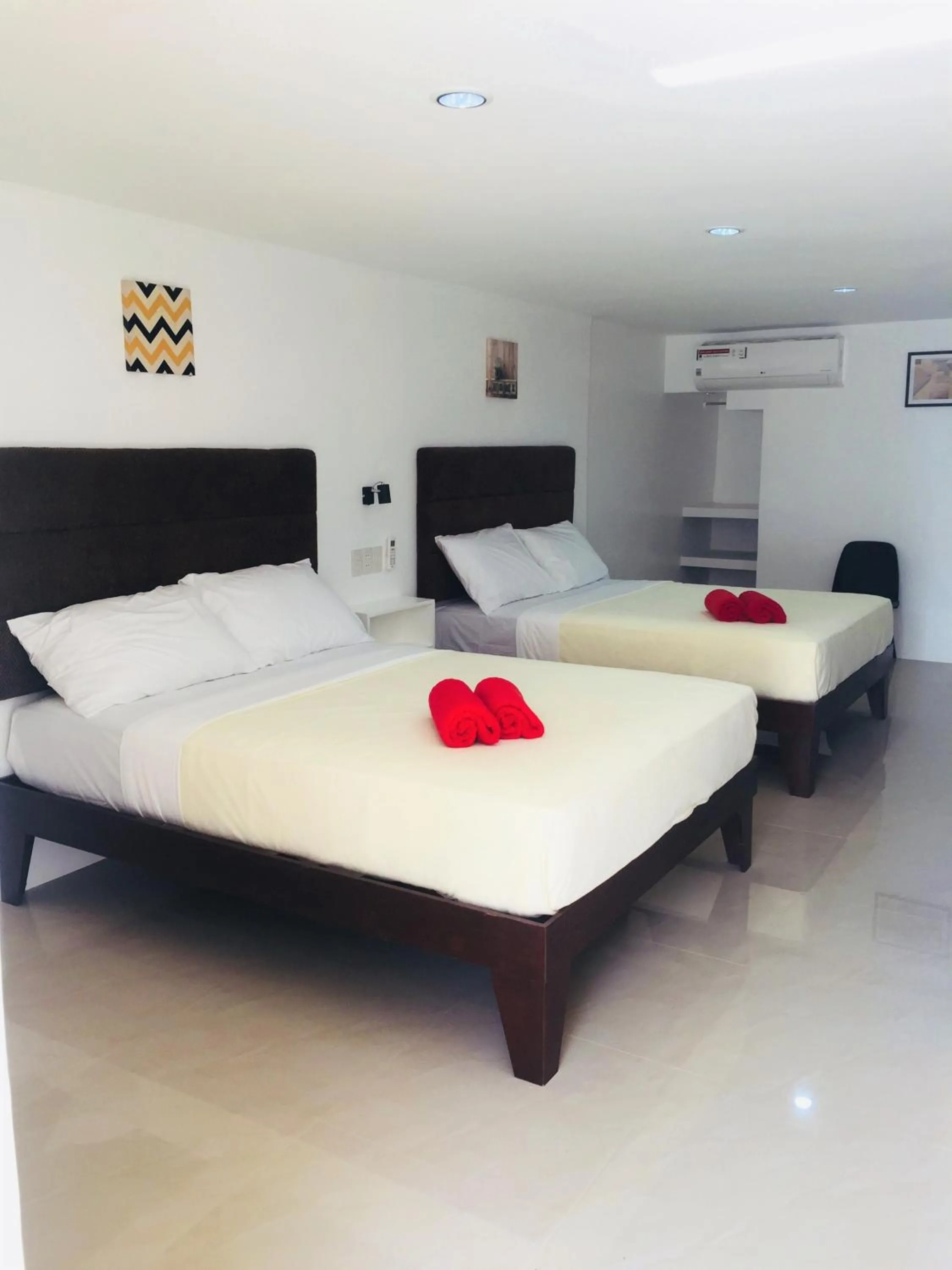Bedroom, Bed in Heartland Hotel Serviced Rooms & Apartments.