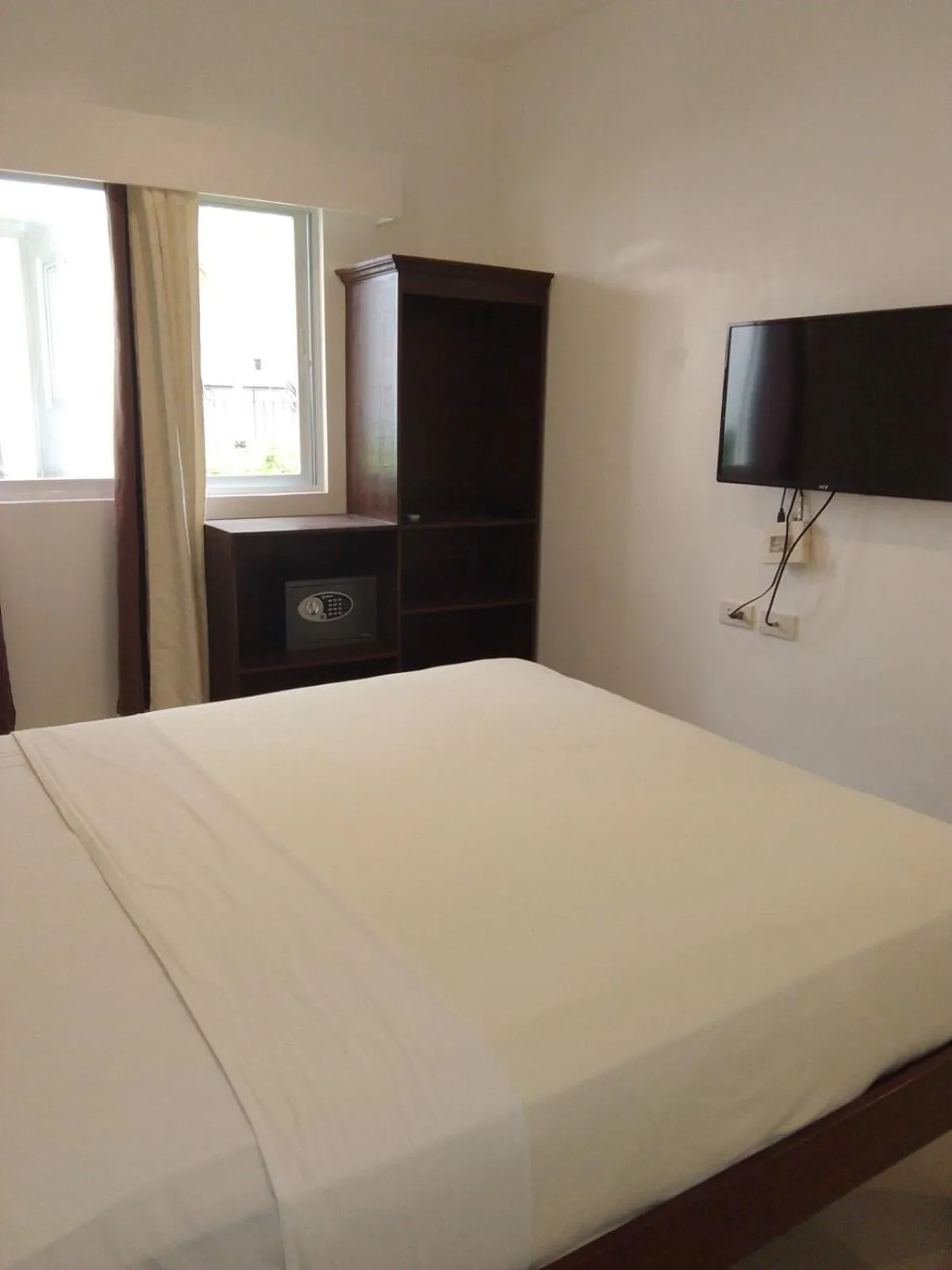 Bed in Heartland Hotel Serviced Rooms & Apartments.