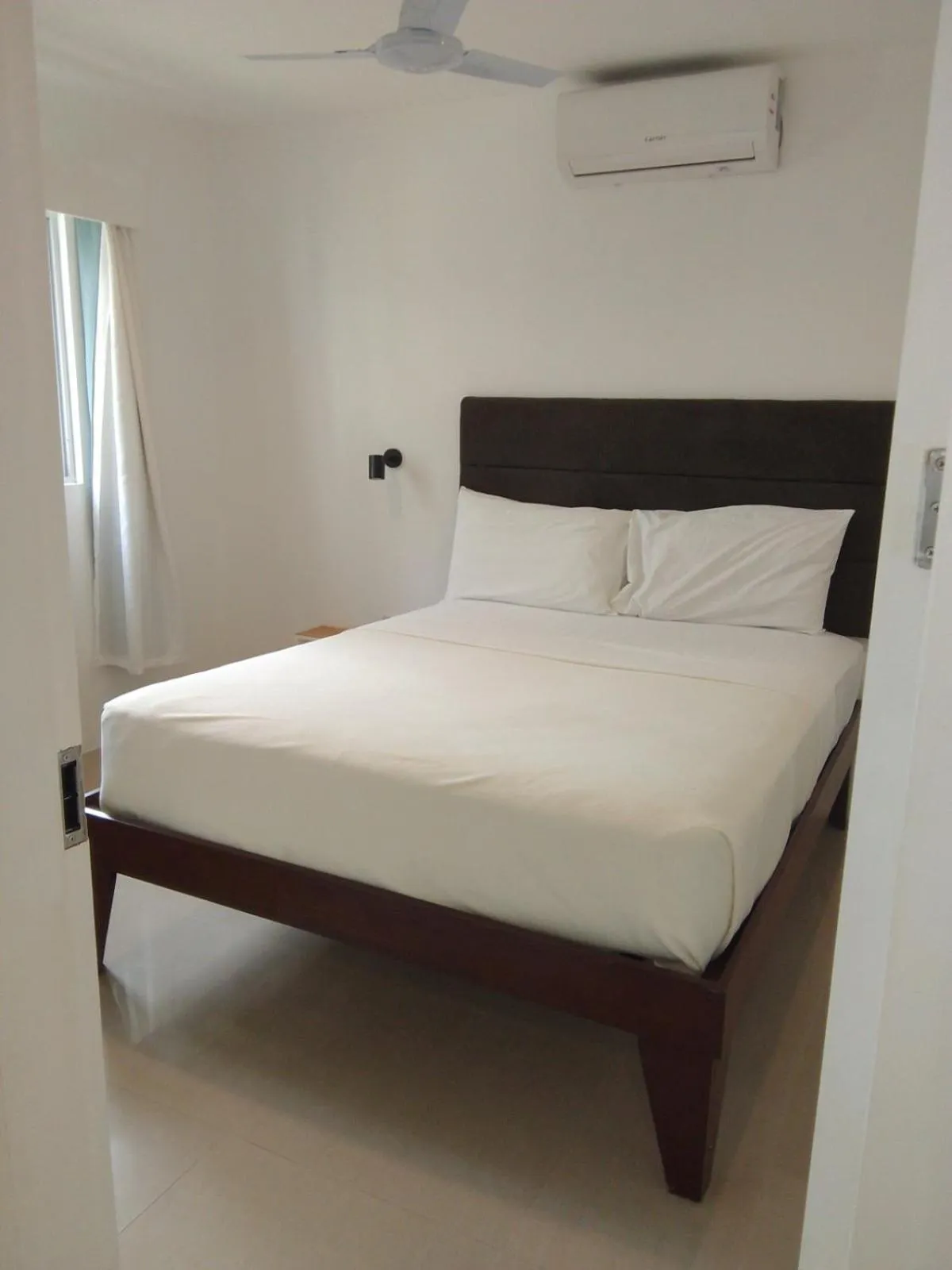 Bed in Heartland Hotel Serviced Rooms & Apartments.