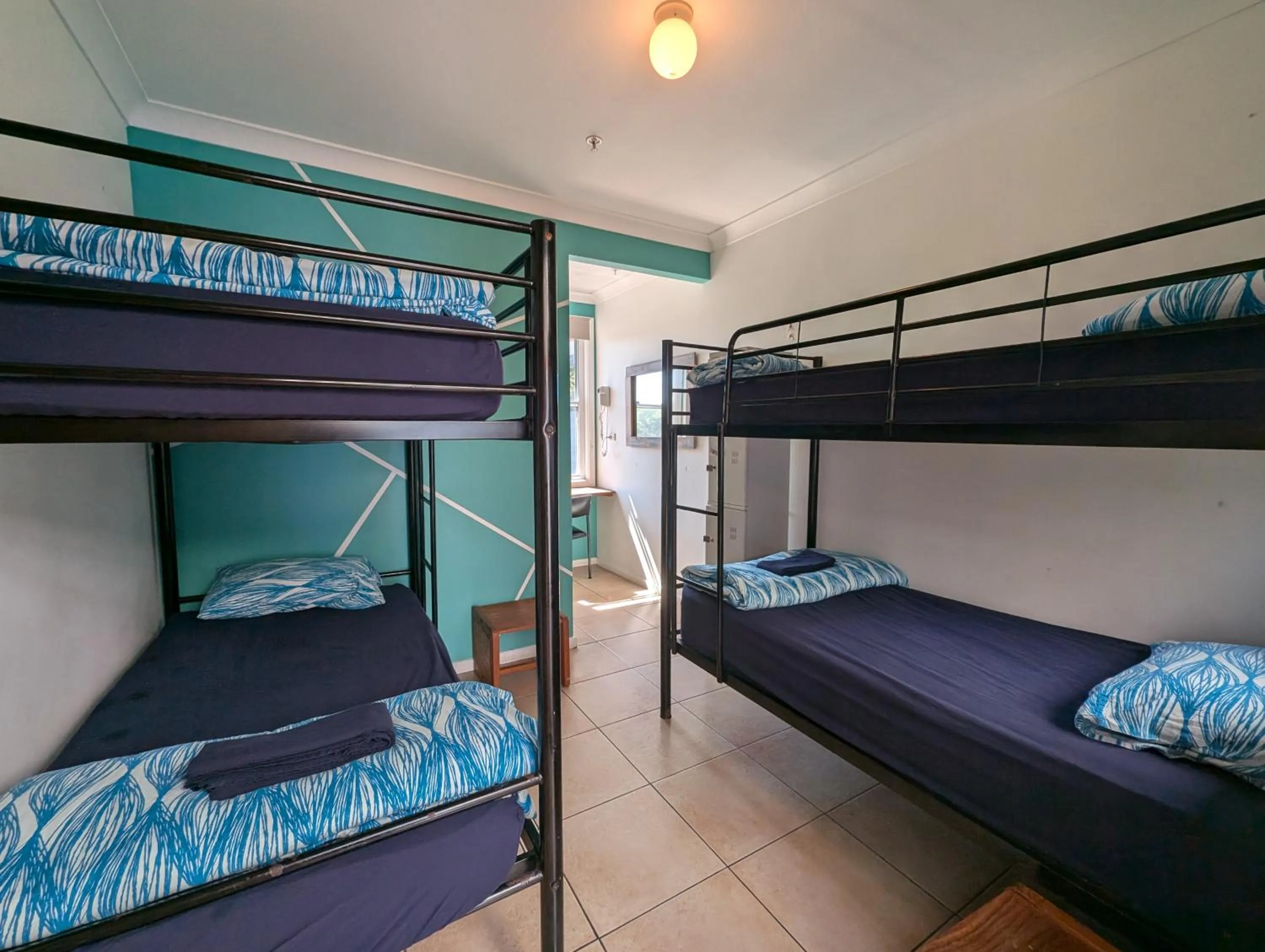Bed in Ozzie Pozzie Backpackers