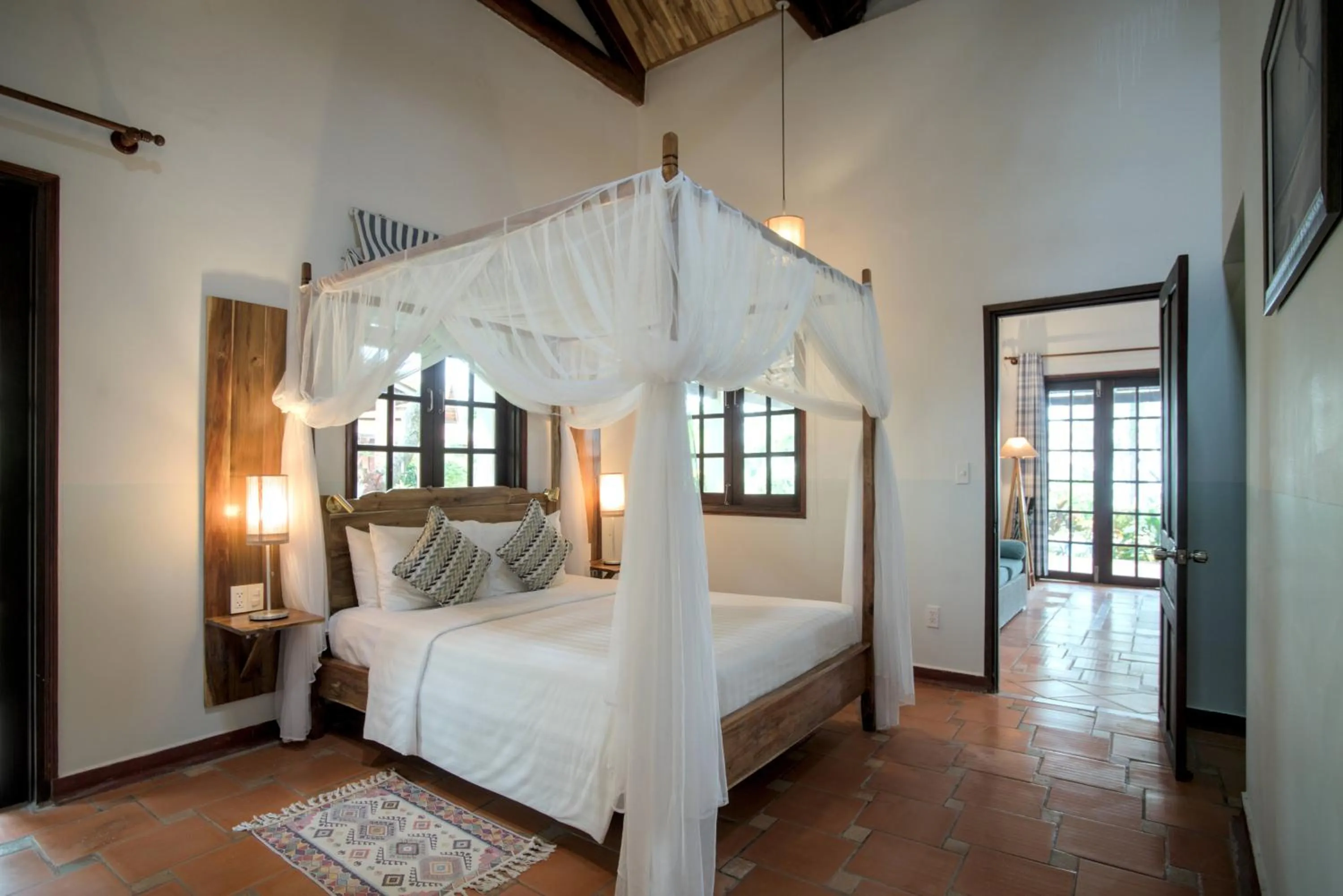 Bed in Cassia Cottage Resort and Spa