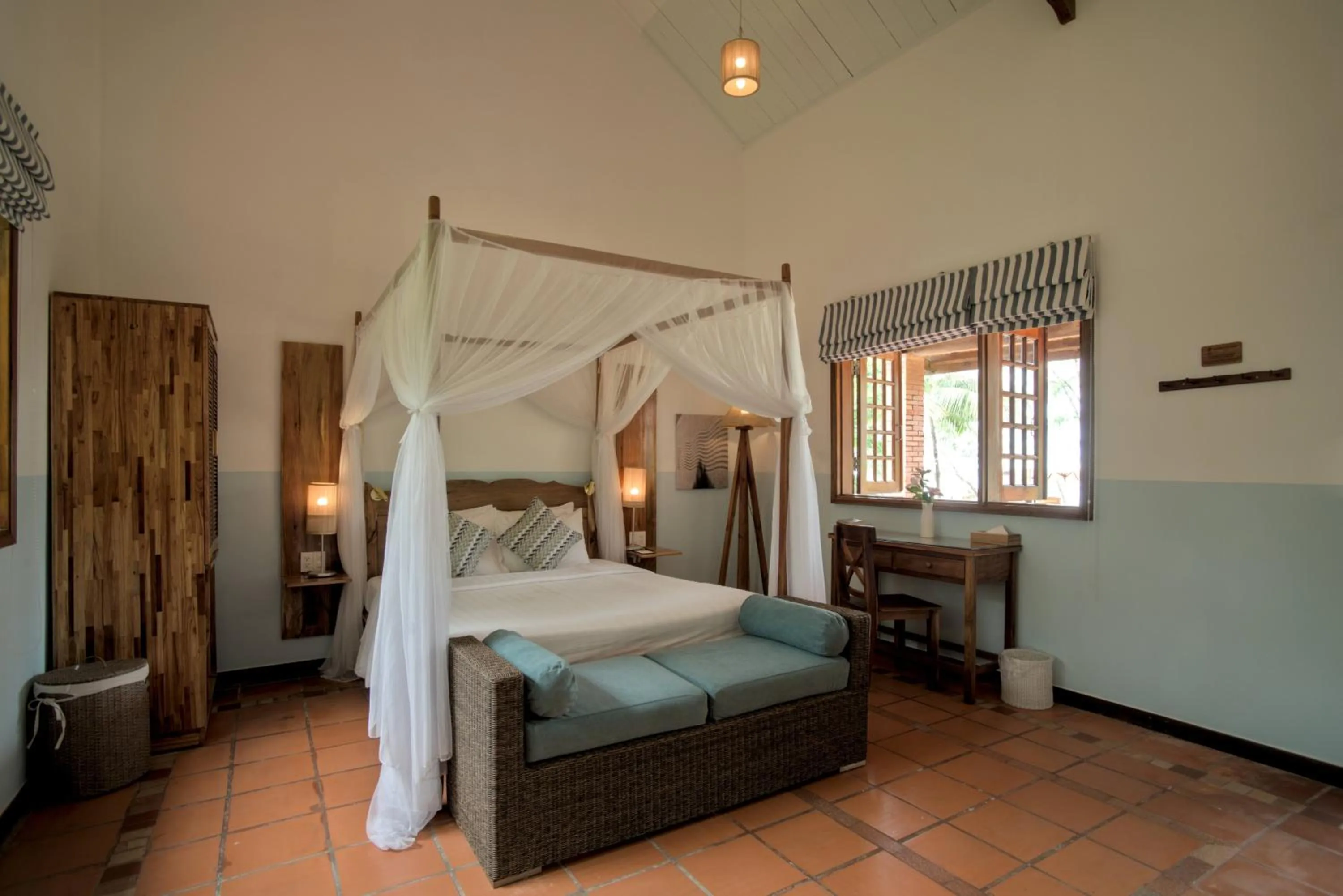 Bed in Cassia Cottage Resort and Spa