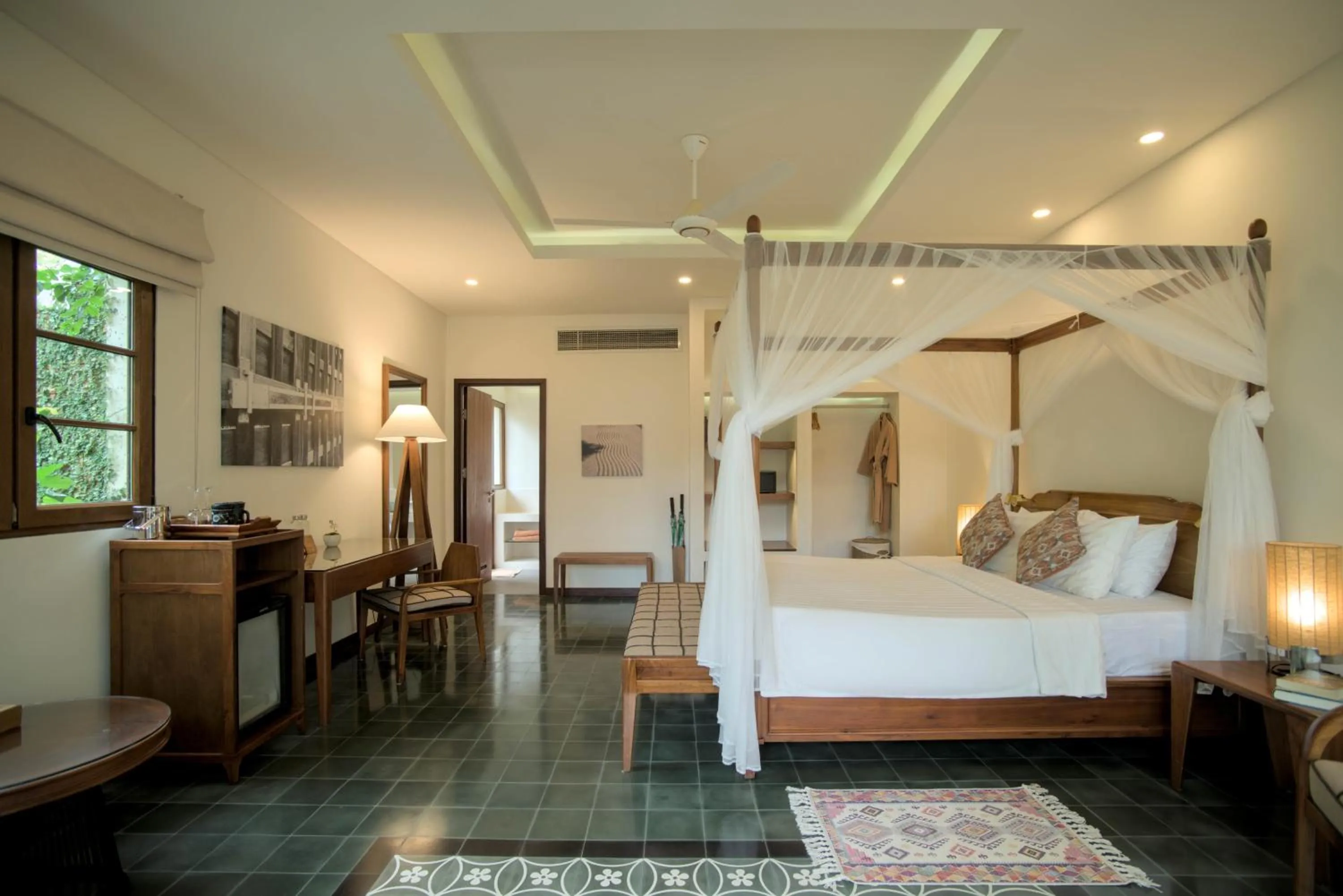Bed in Cassia Cottage Resort and Spa