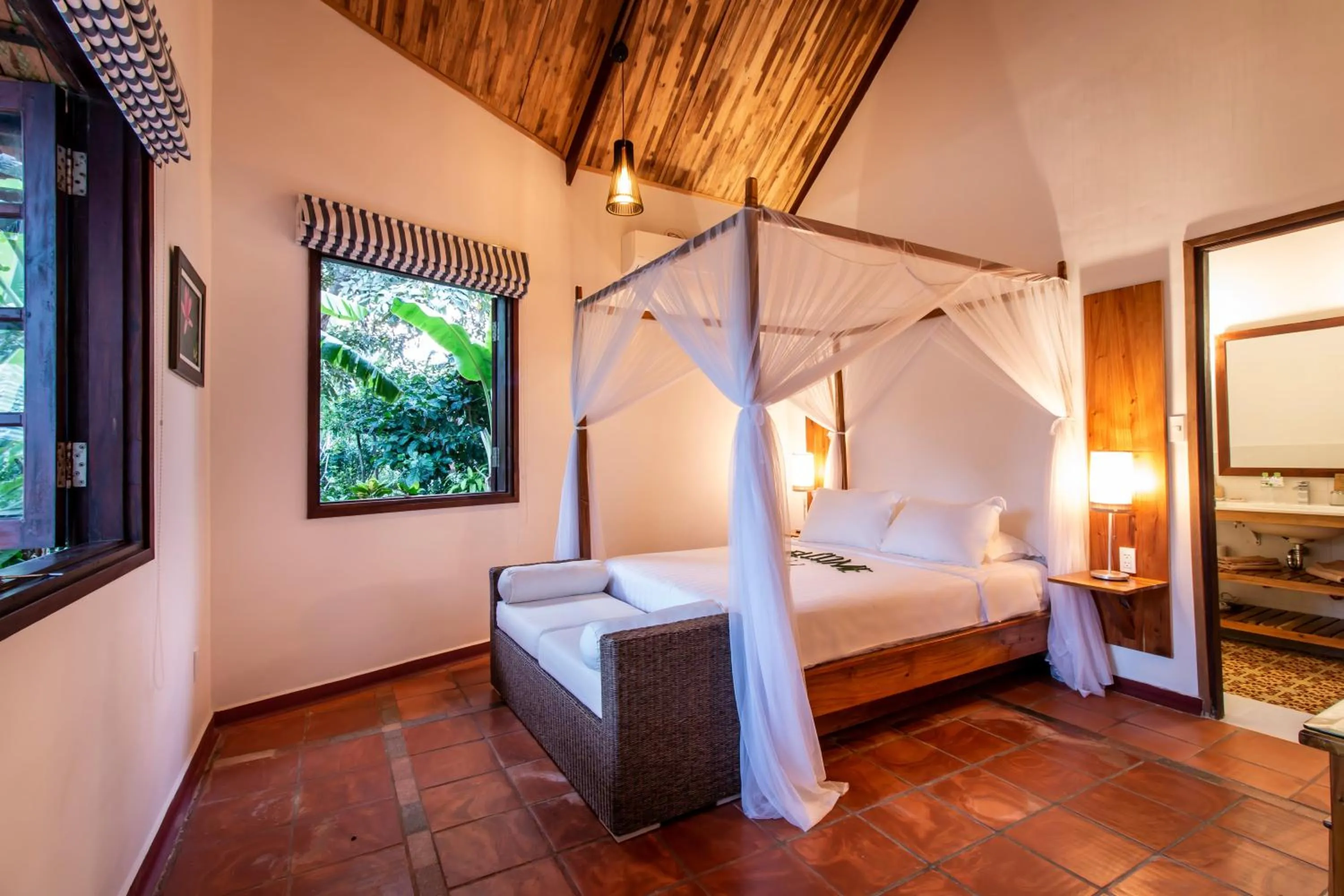 Bedroom, Bed in Cassia Cottage Resort and Spa