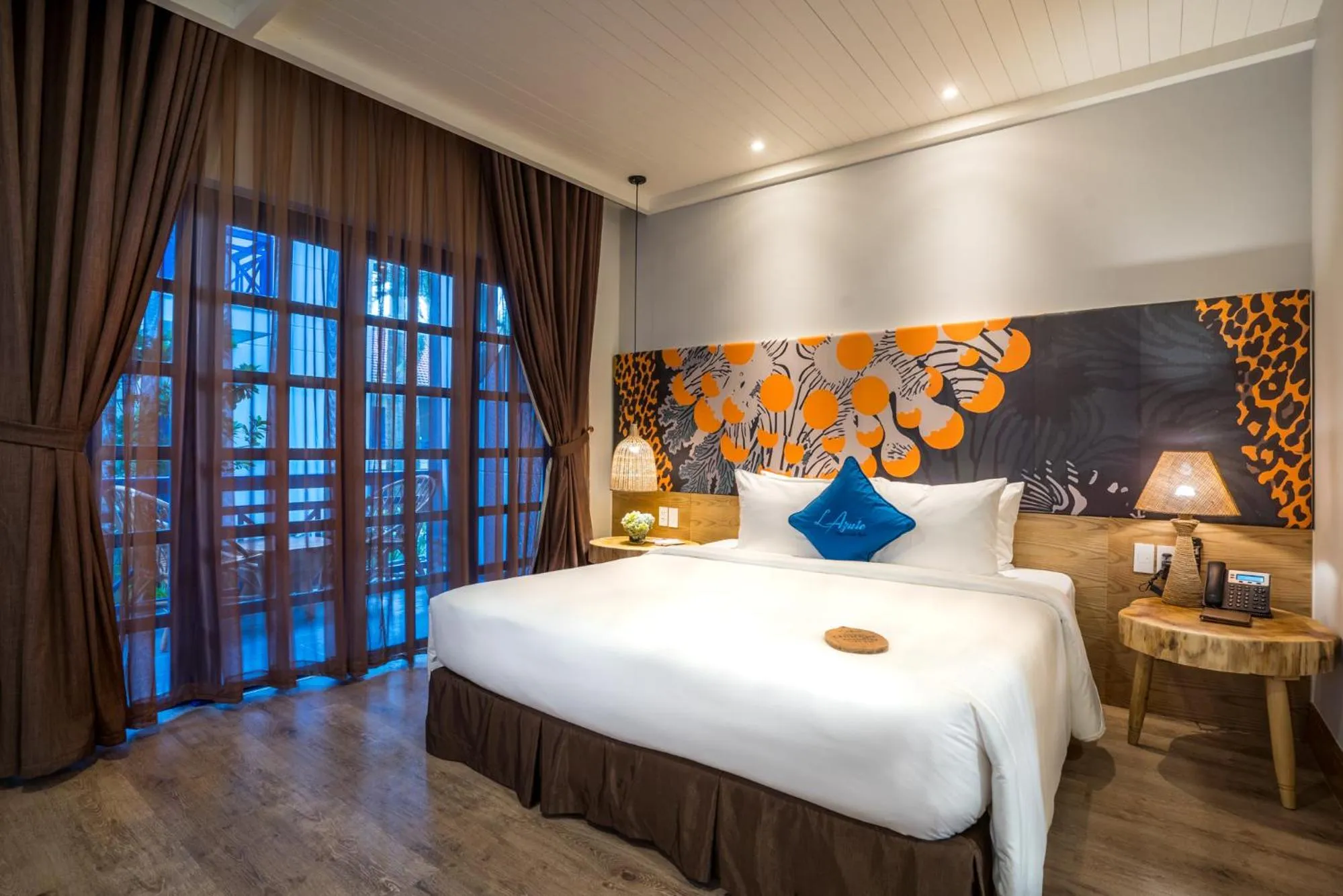 Bed in L'Azure Resort and Spa