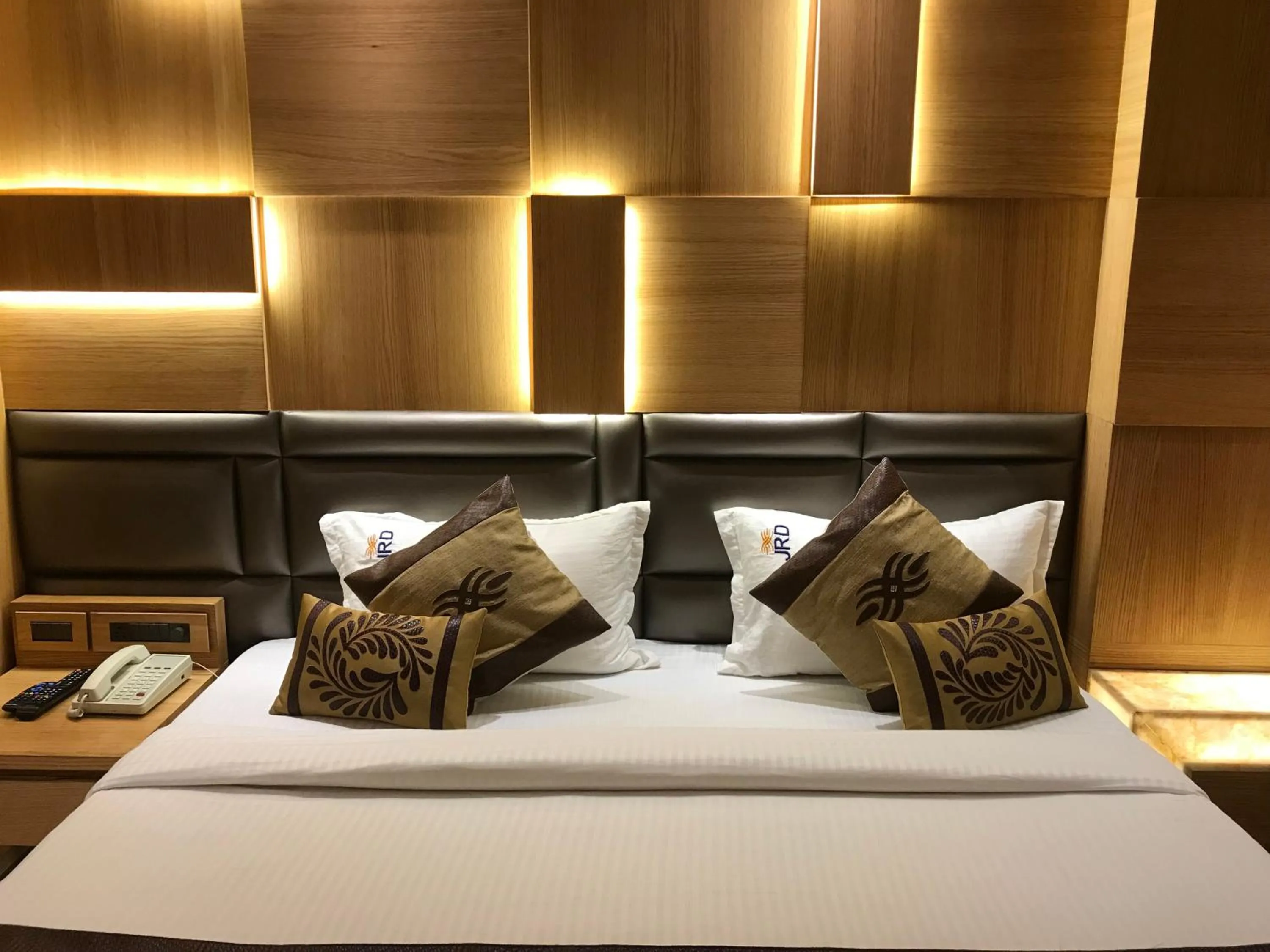 Bed in JRD Pride-Business Hotel