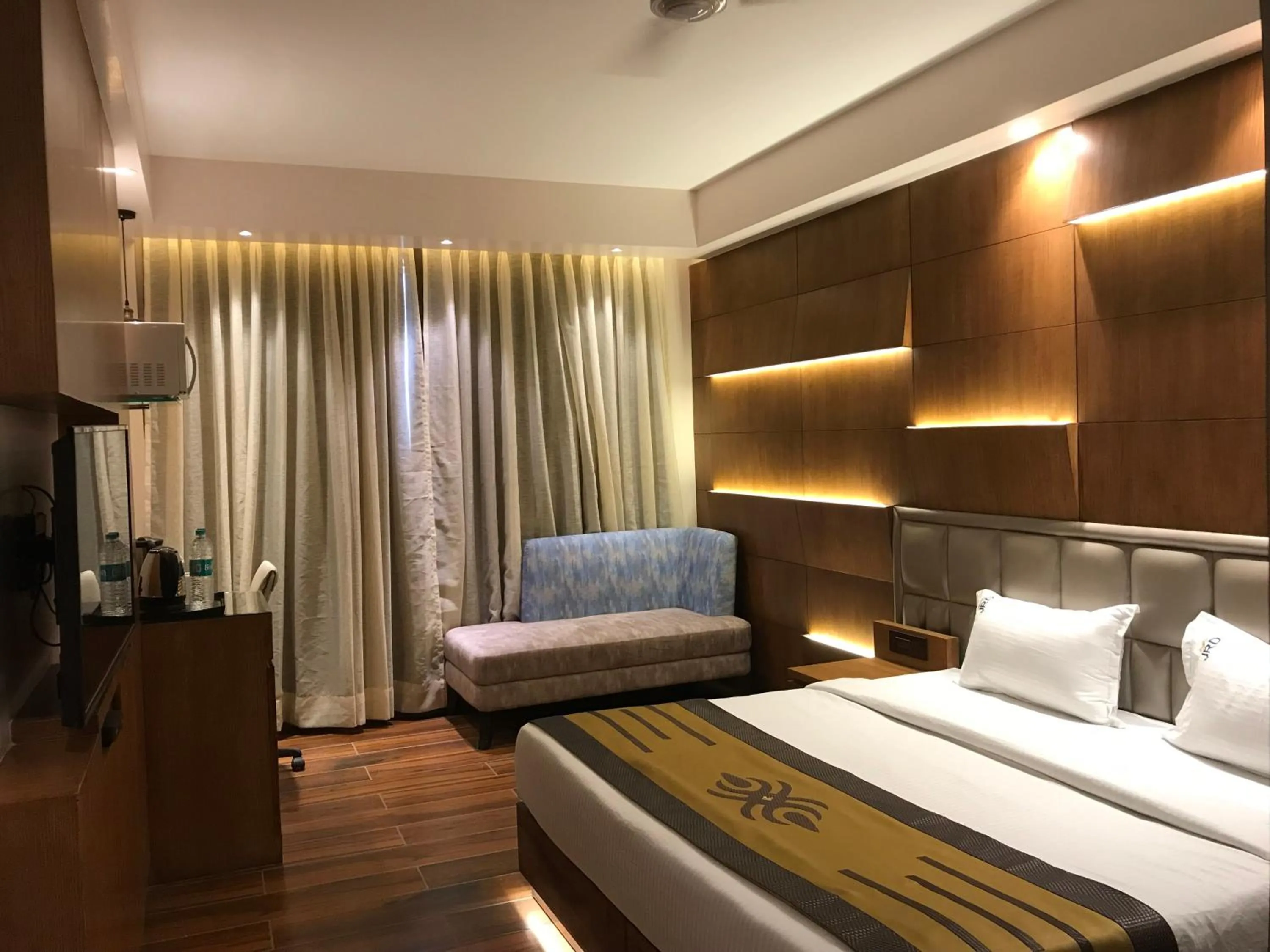 Bed in JRD Pride-Business Hotel