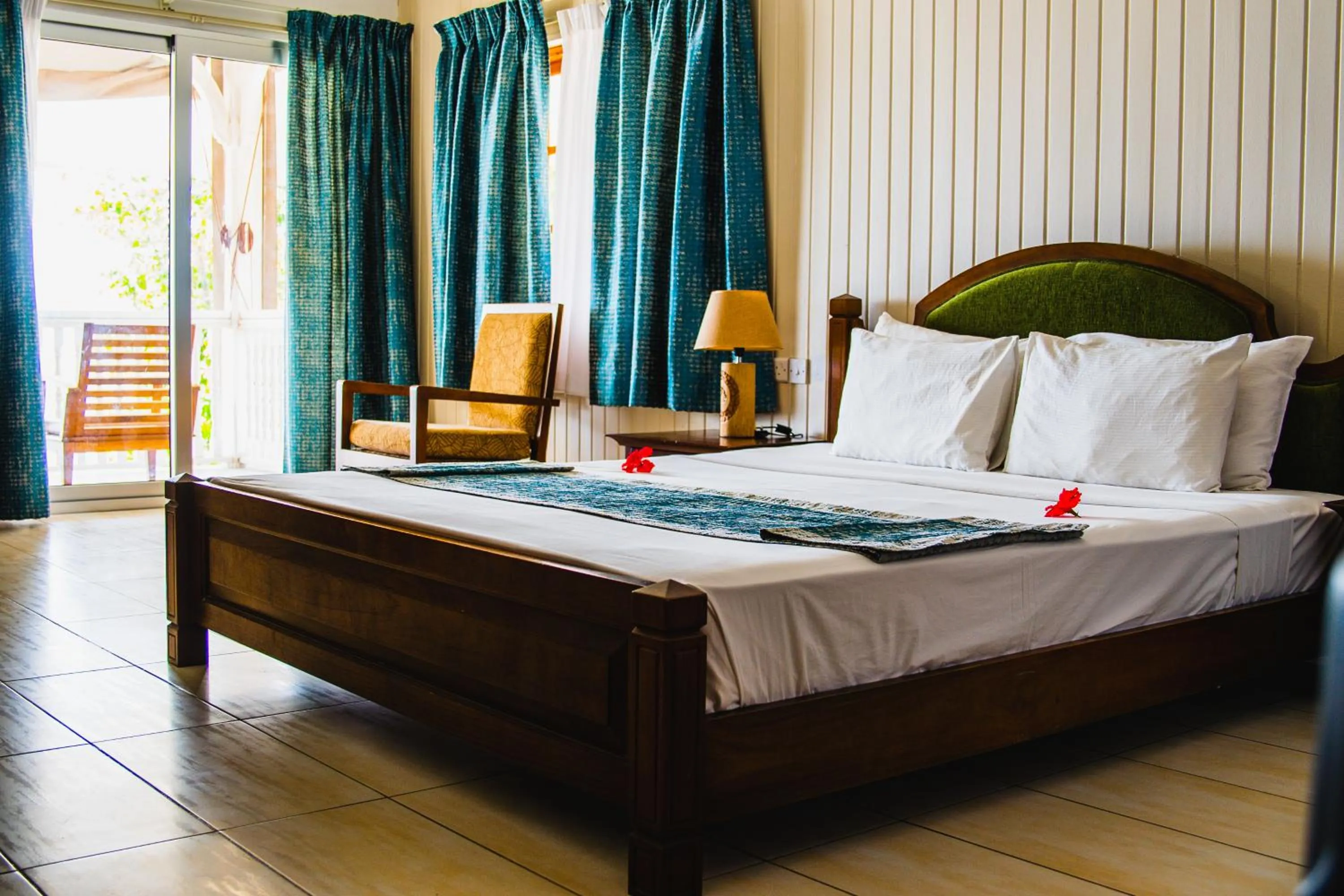 Bed in La Digue Island Lodge