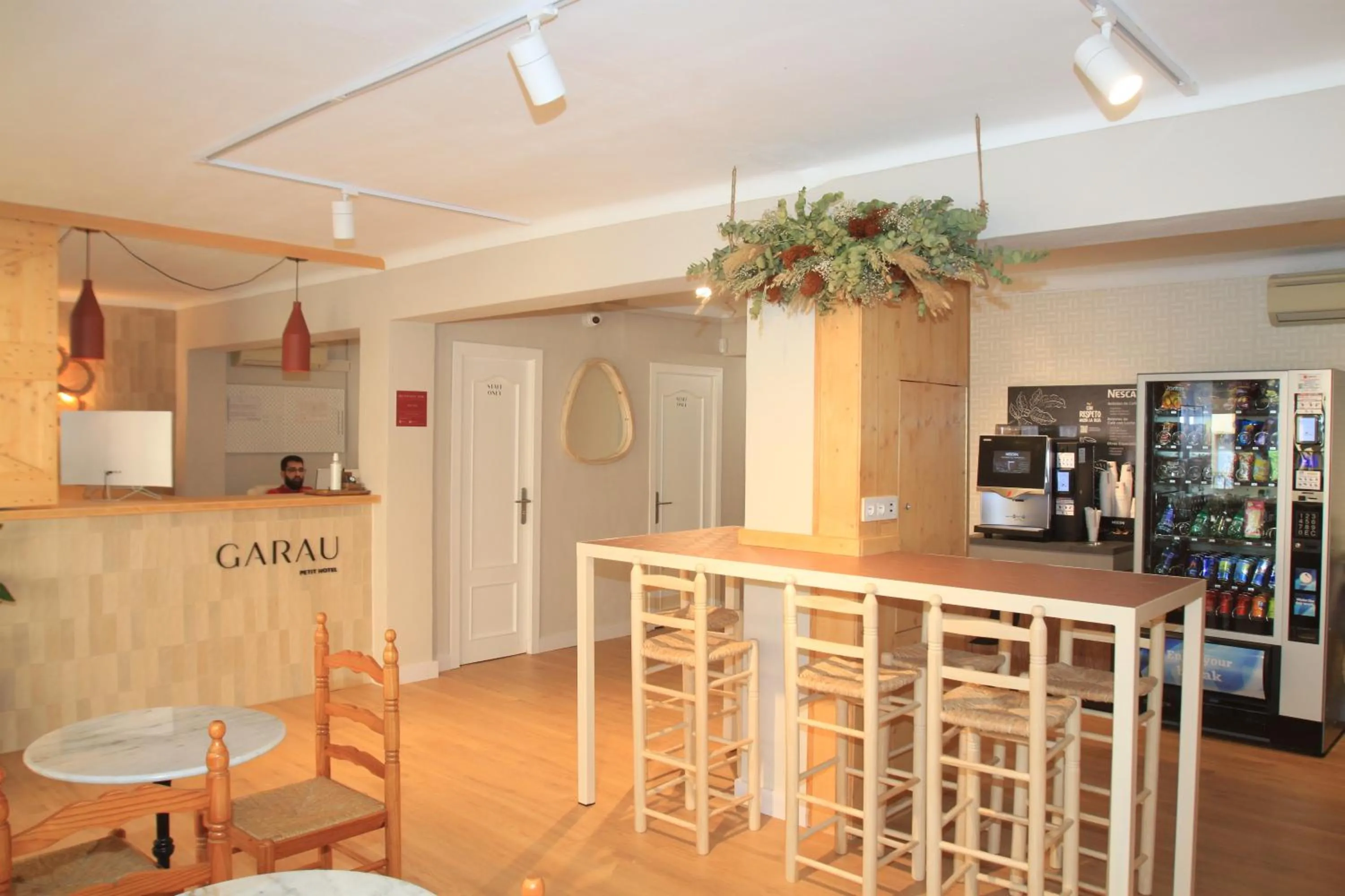 Lobby or reception in Garau Petit Hotel