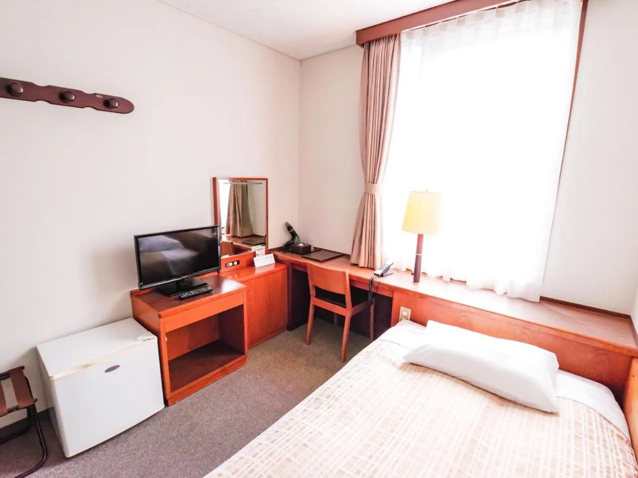 Bedroom, Bed in Reisenkaku Hotel Ekimae