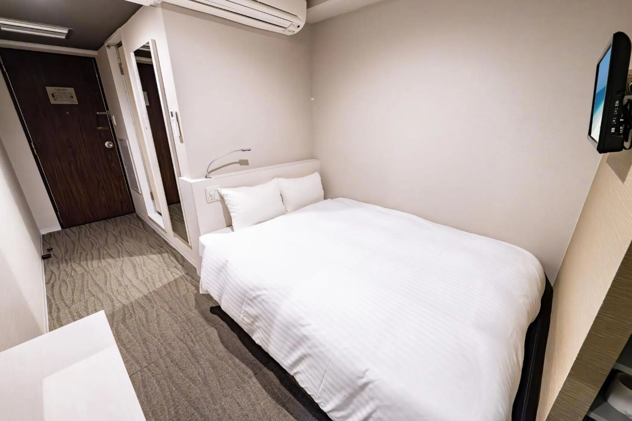 Bed in Reisenkaku Hotel Kawabata