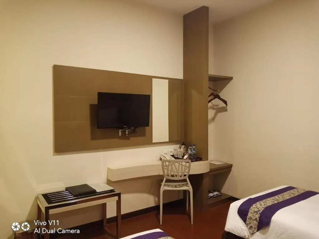 Bed in Ayla City Hotel