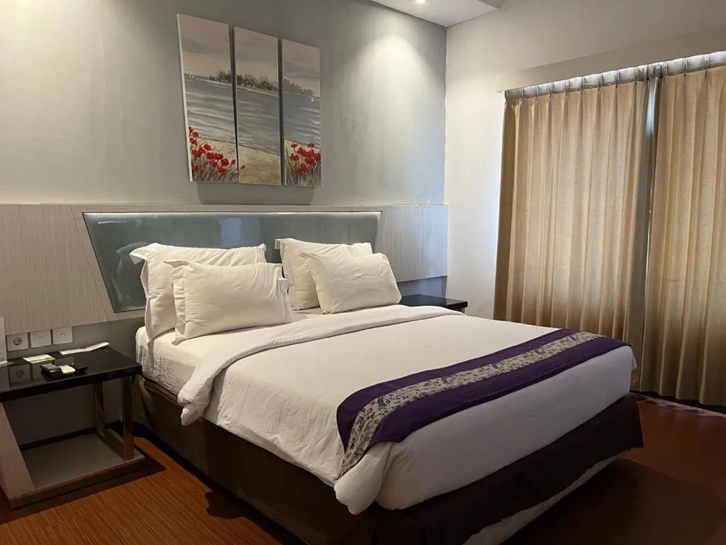 Bed in Ayla City Hotel