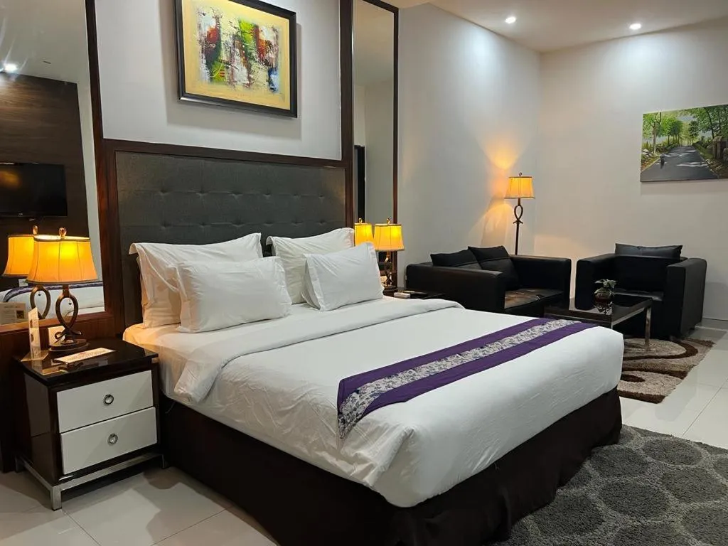 Bed in Ayla City Hotel