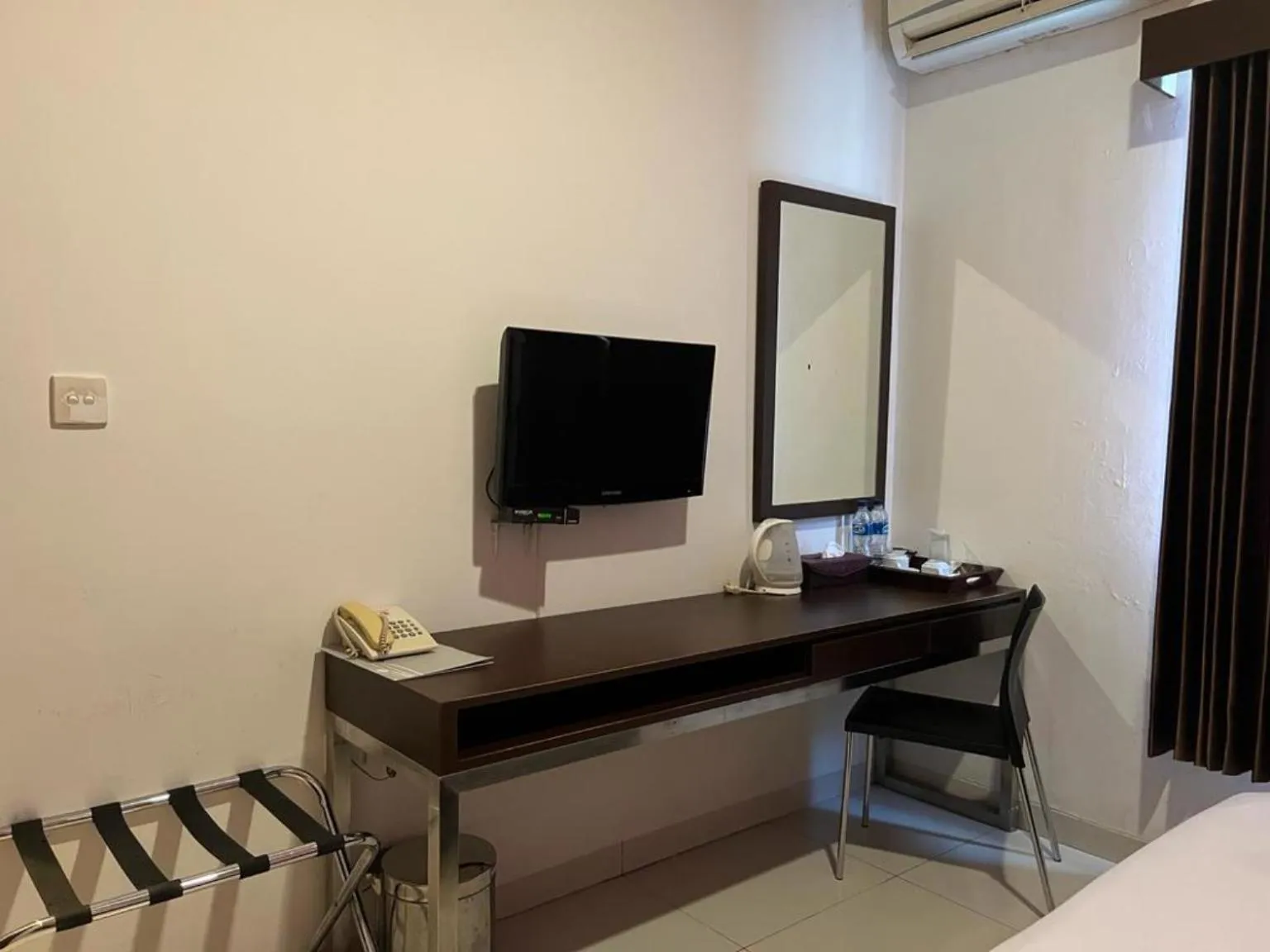 Bed in Ayla City Hotel