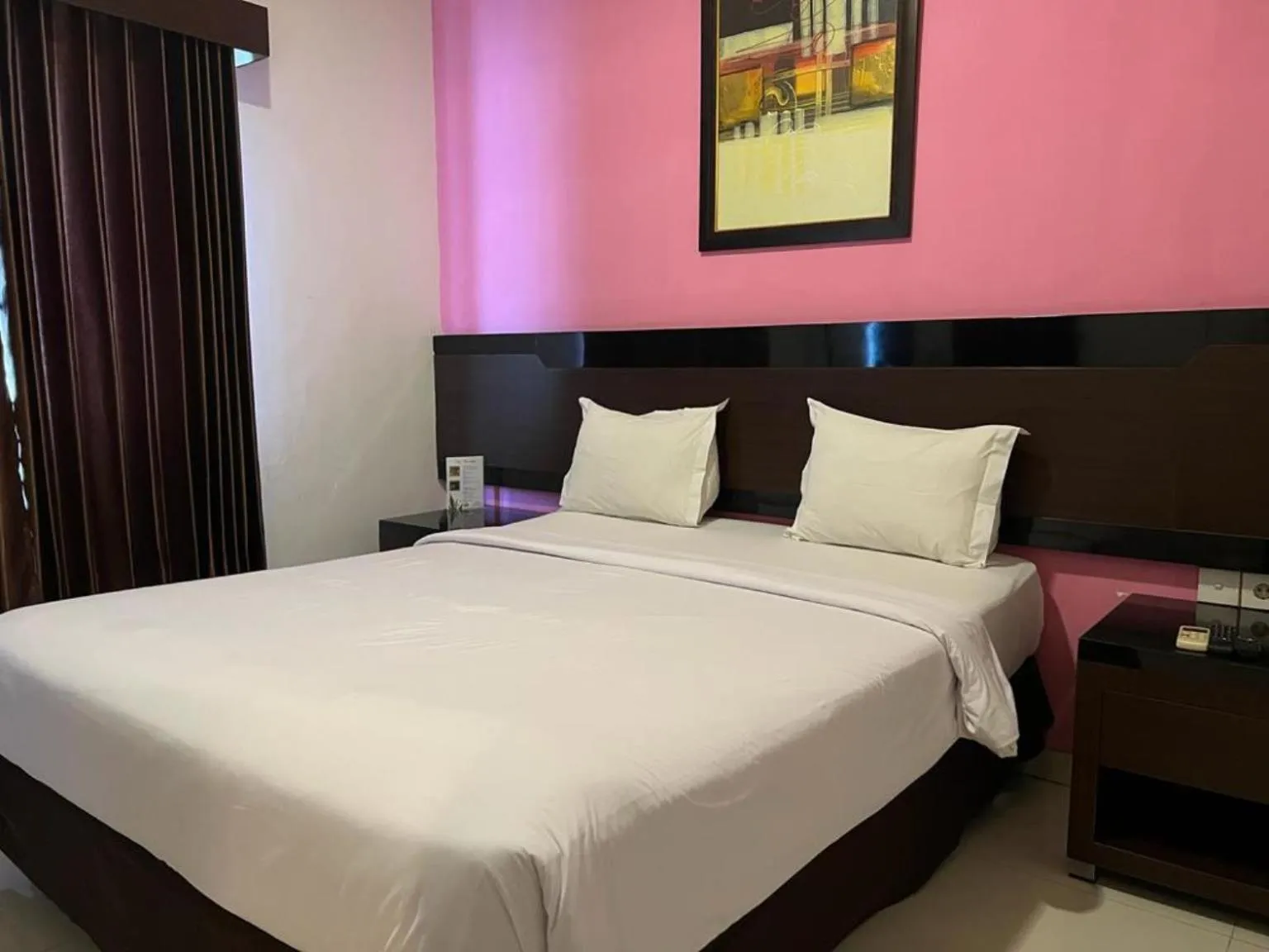 Bed in Ayla City Hotel