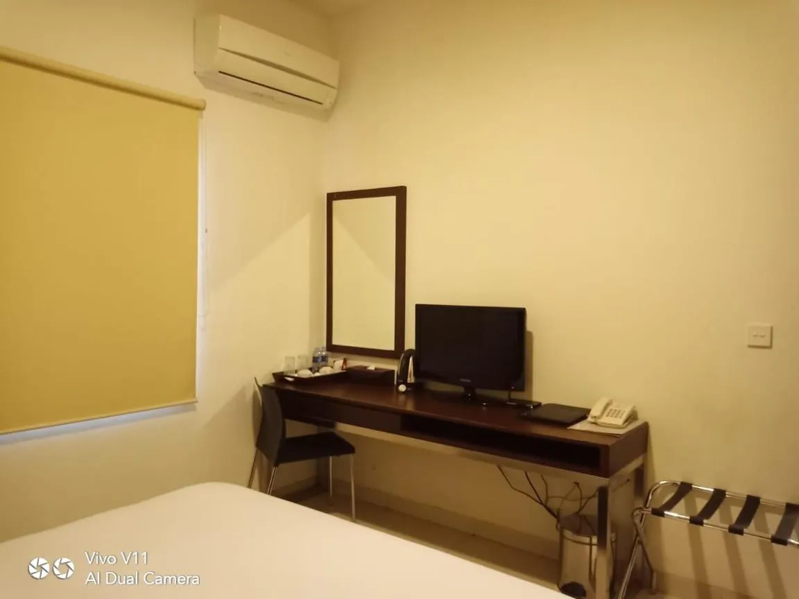 Bed in Ayla City Hotel