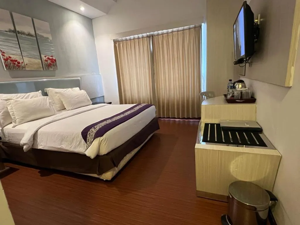 Bed in Ayla City Hotel