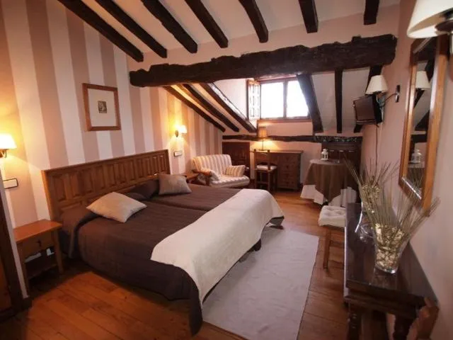 Photo of the whole room, Bed in Posada Santa Juliana