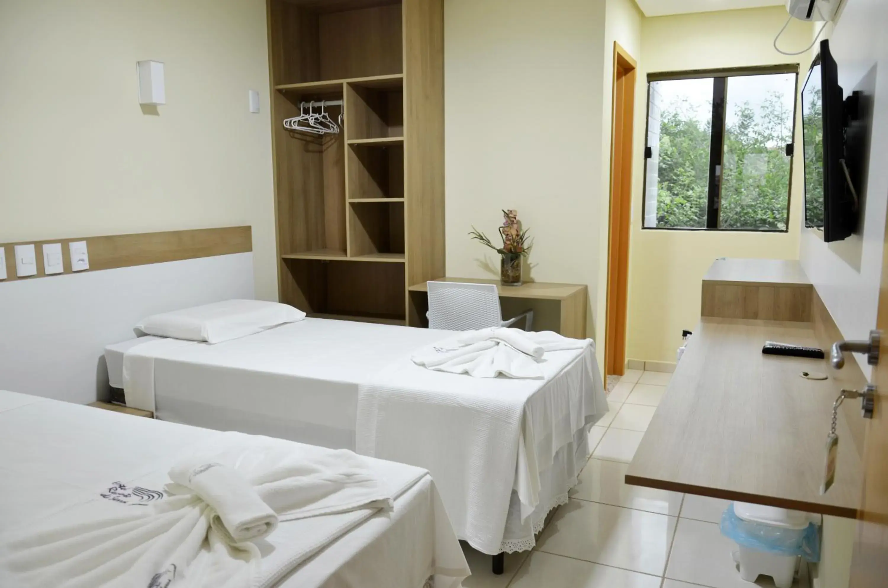 Economy Triple Room in Hotel Recanto Vip Economy Triple Room in Hotel Recanto Vip