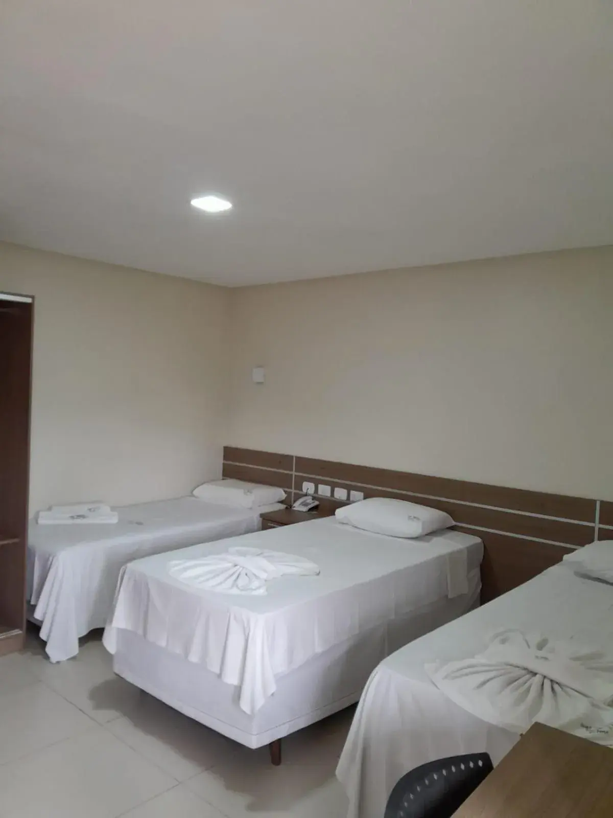 Economy Triple Room in Hotel Recanto Vip Economy Triple Room in Hotel Recanto Vip