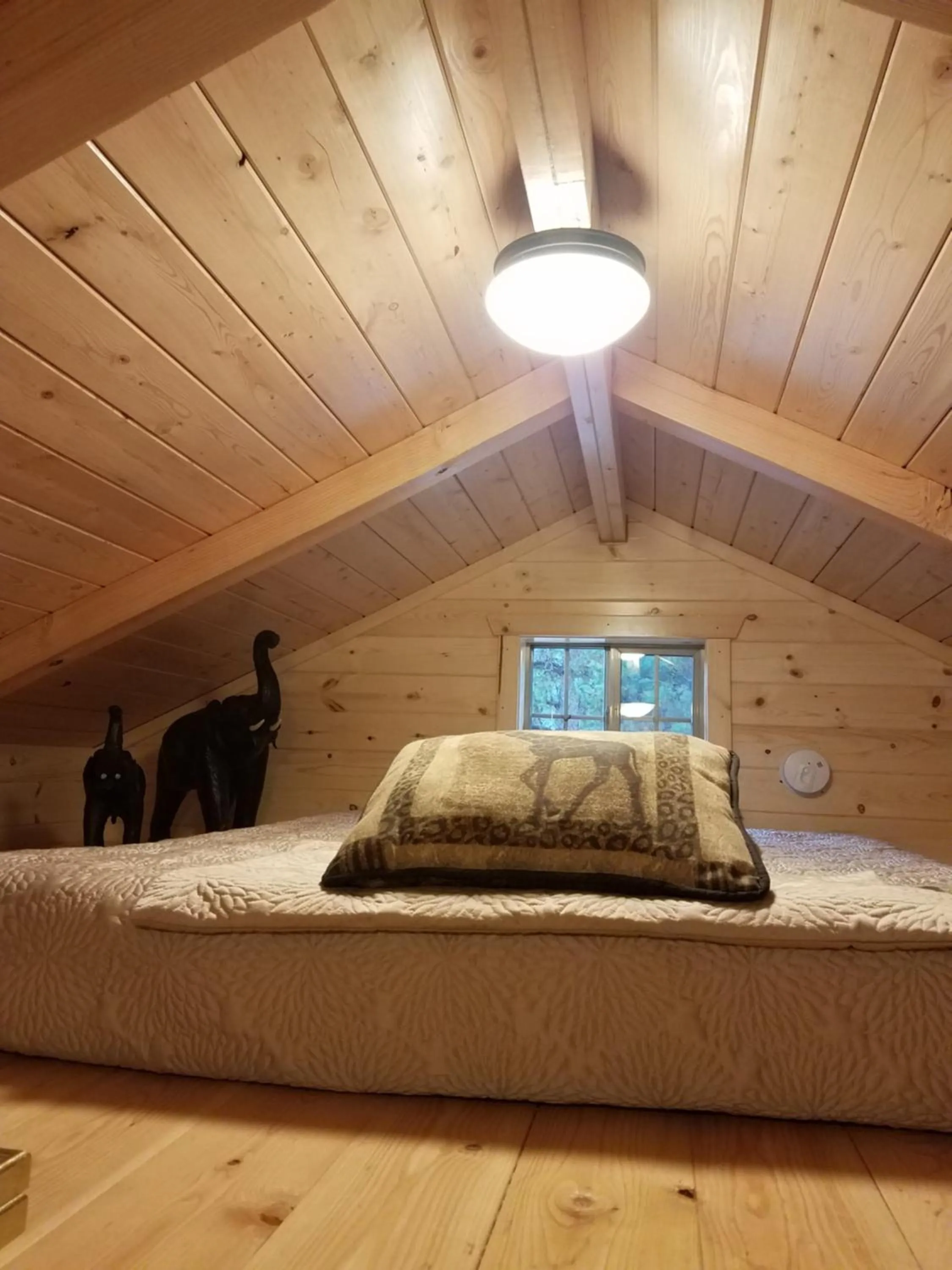 Bed in The Wild Game Inn