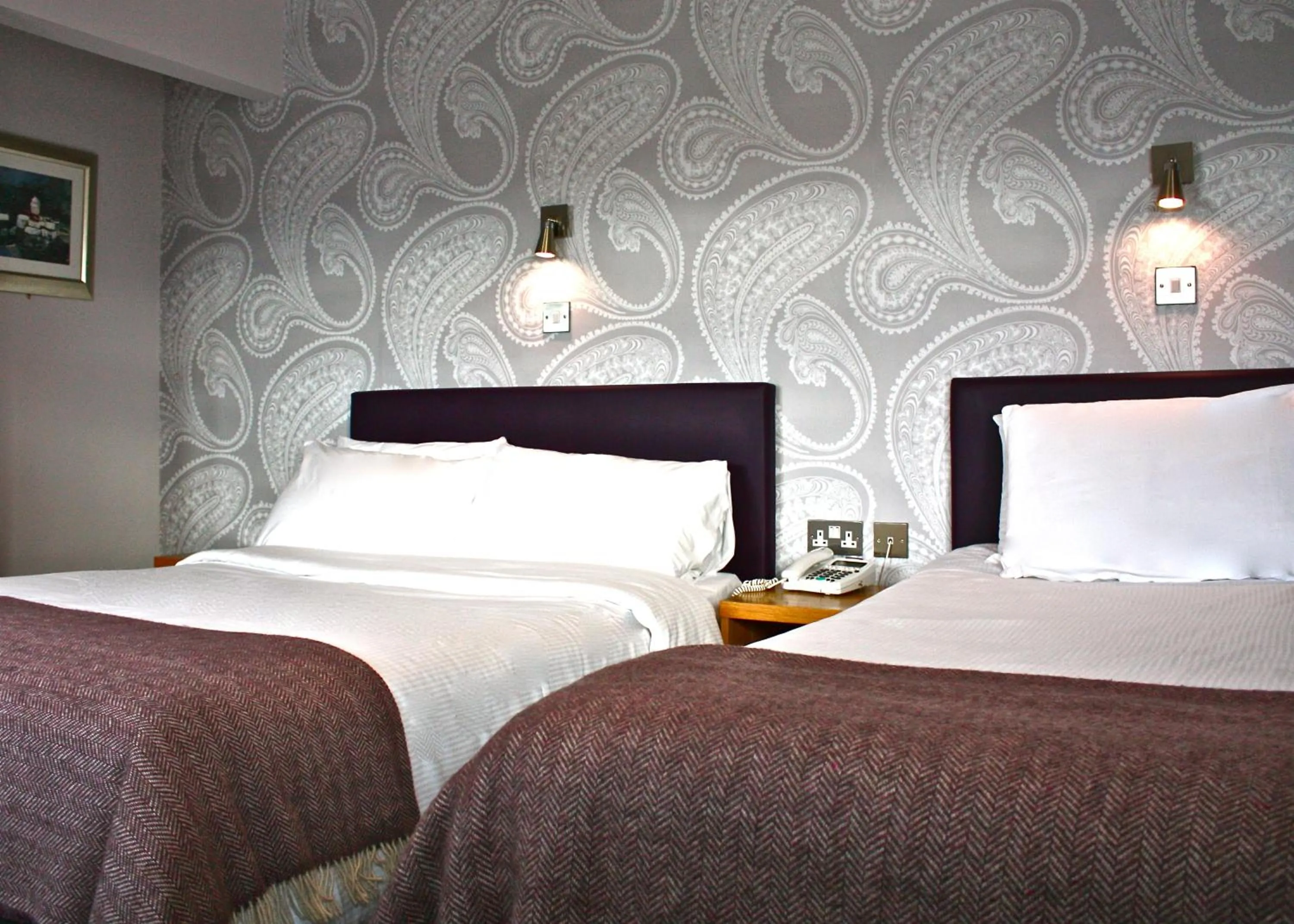 Bed in Jackson Court Hotel