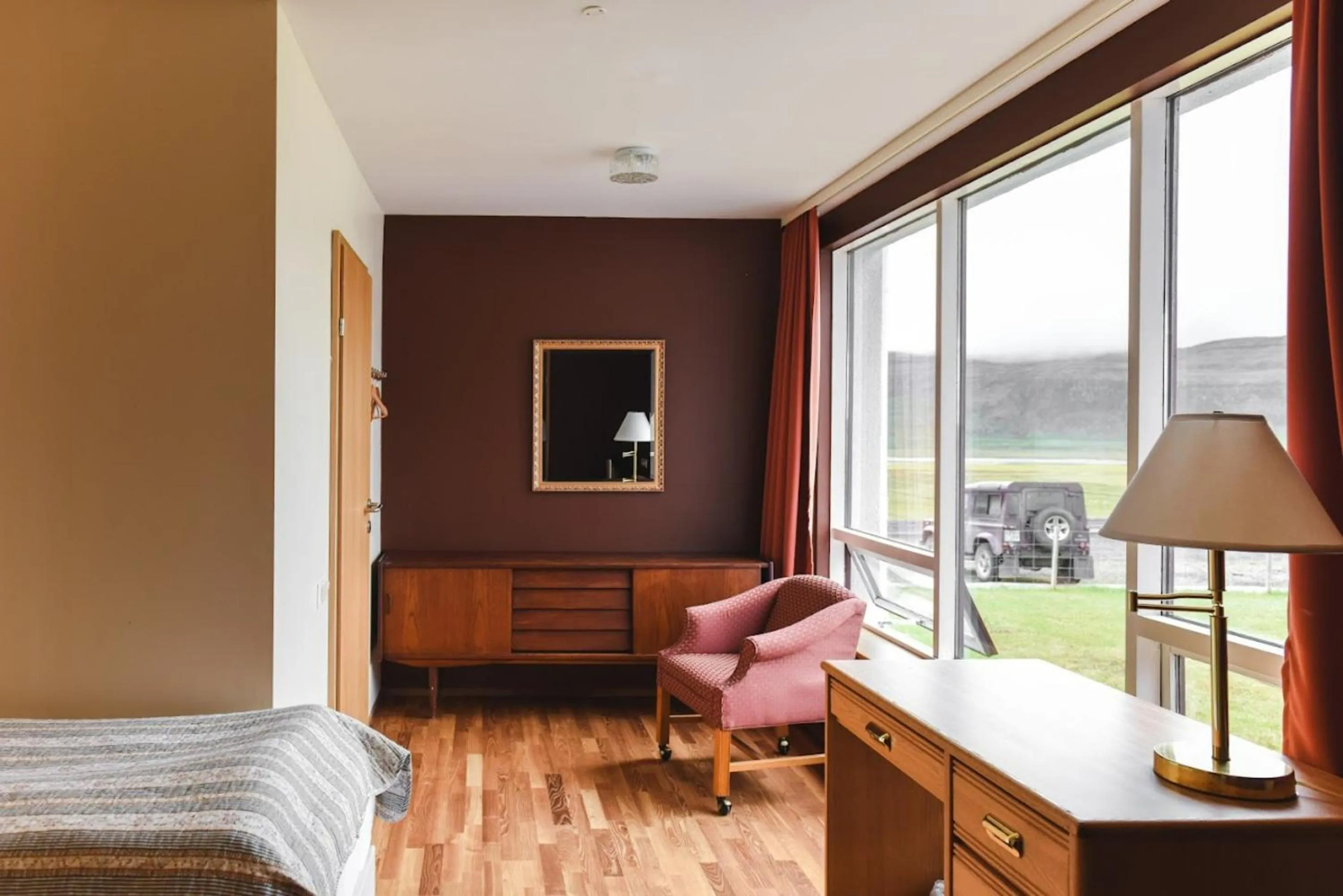 Seating area, Bed in Hotel Latrabjarg