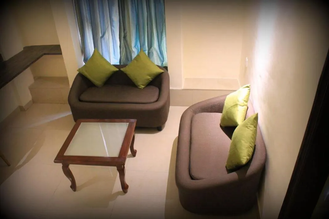 Seating area in Magnus Calypso Suites Viman Nagar