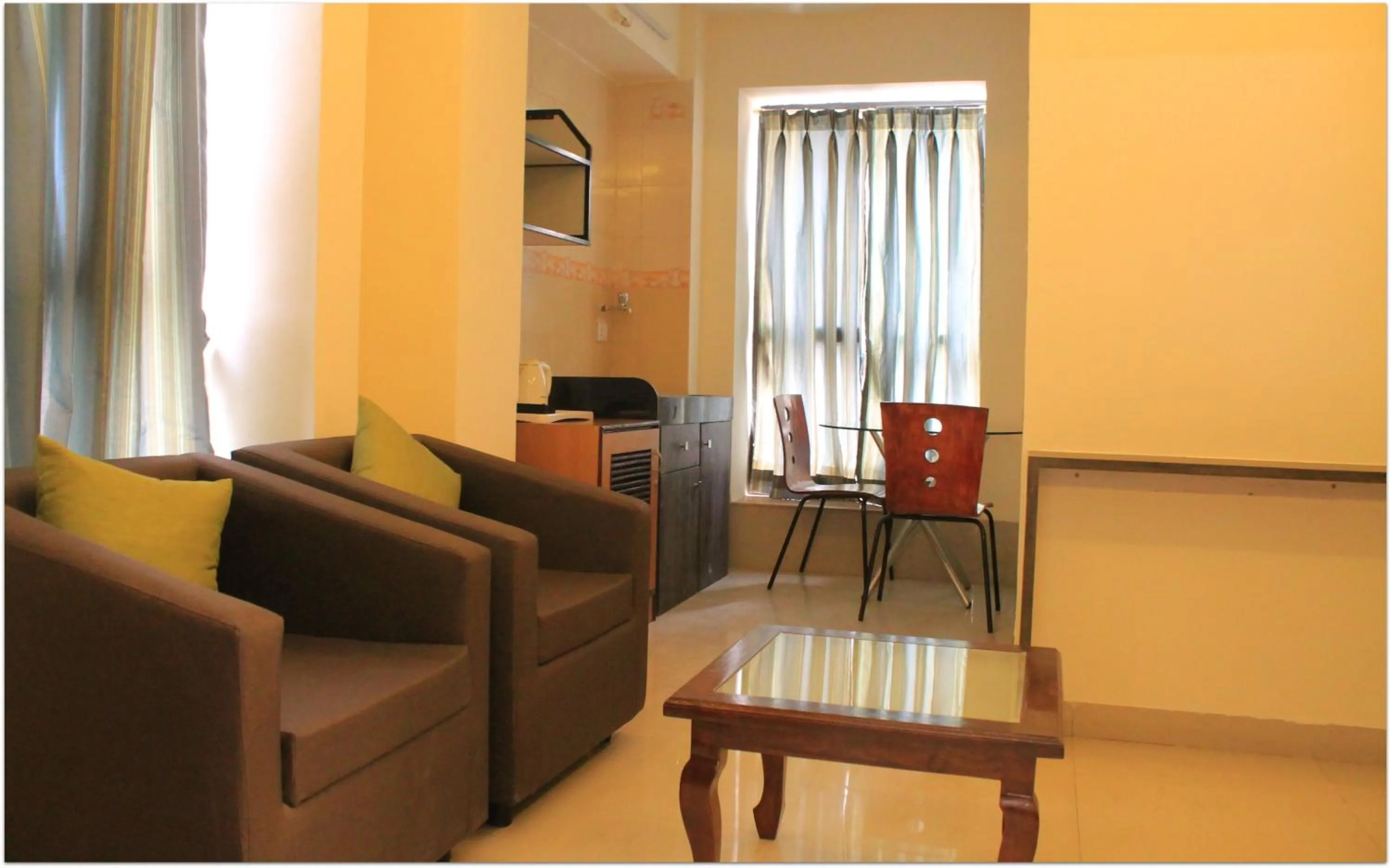 Seating area in Magnus Calypso Suites Viman Nagar