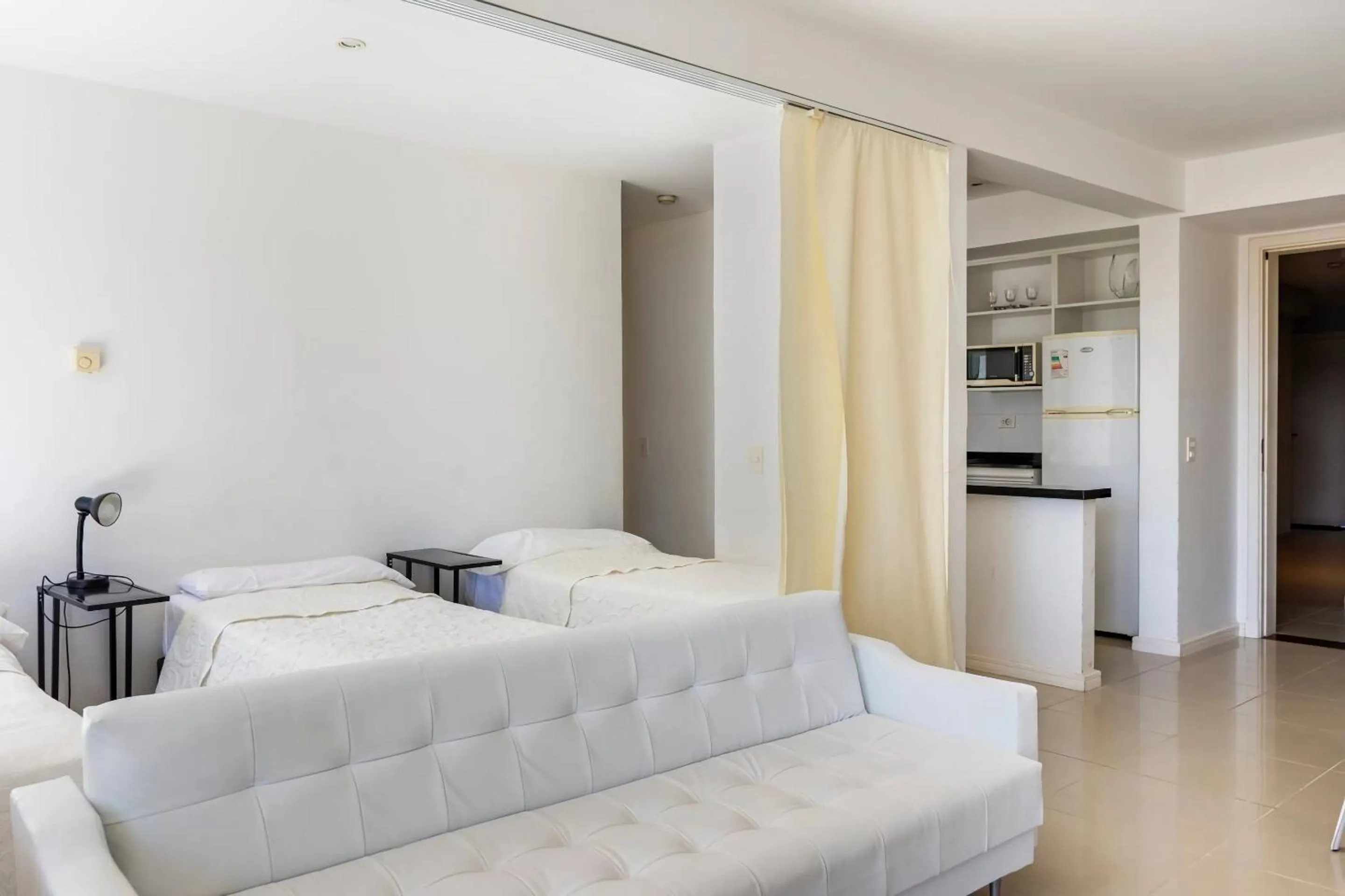 Bed in Arenas del Mar Apartments