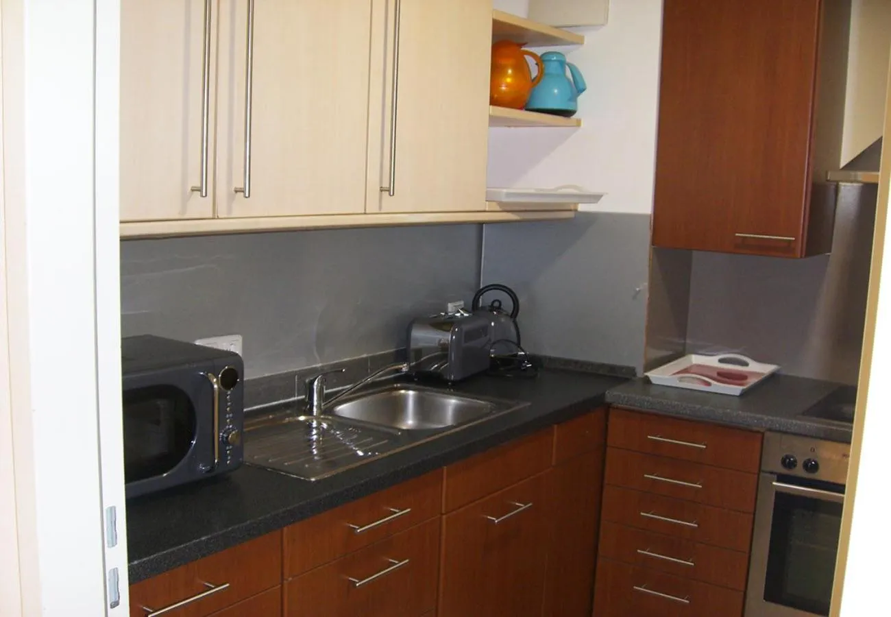 Kitchen or kitchenette in Baynunah Suites Aparthotel