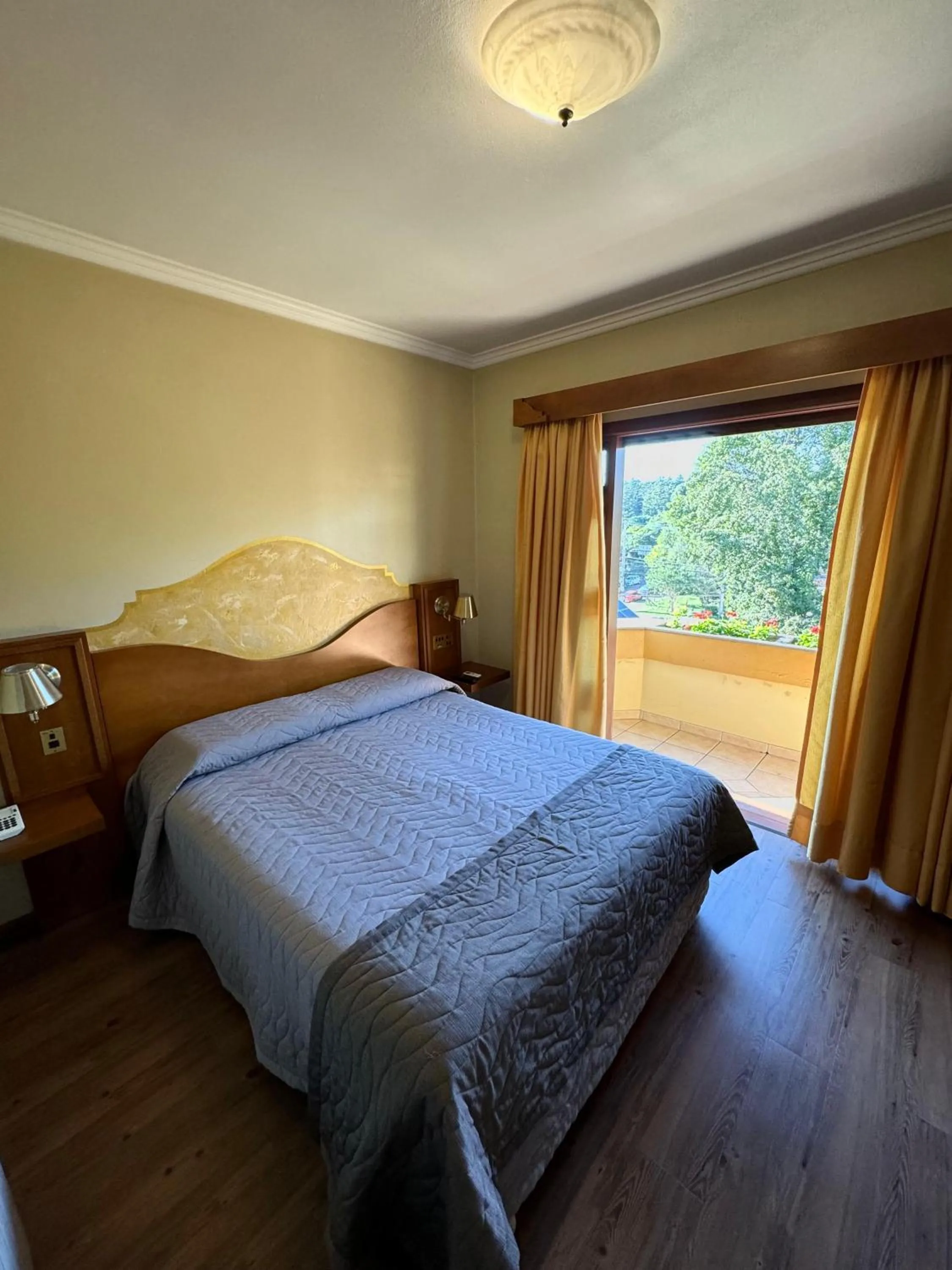 Bed in Pousada Vovó Carolina