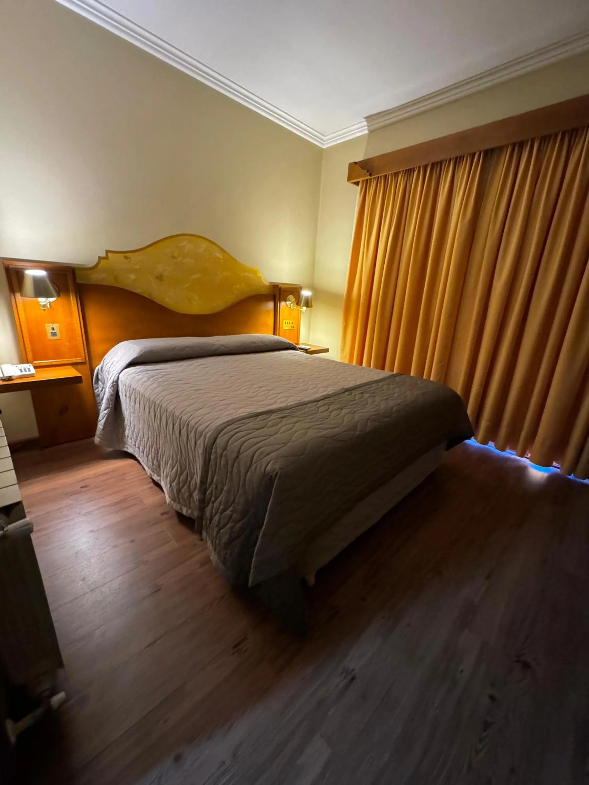 Bed in Pousada Vovó Carolina