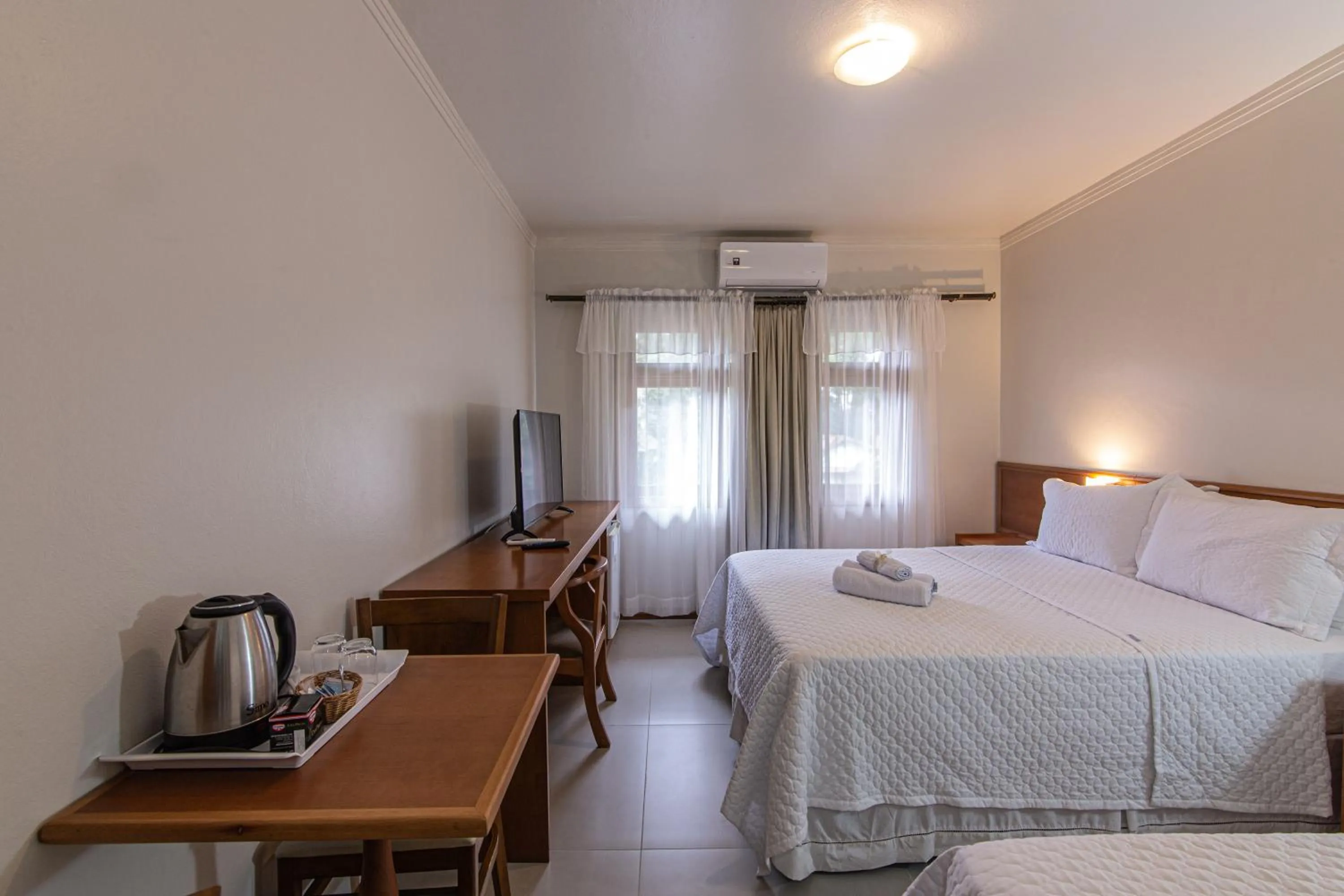 Bed in Pousada Villa Verde