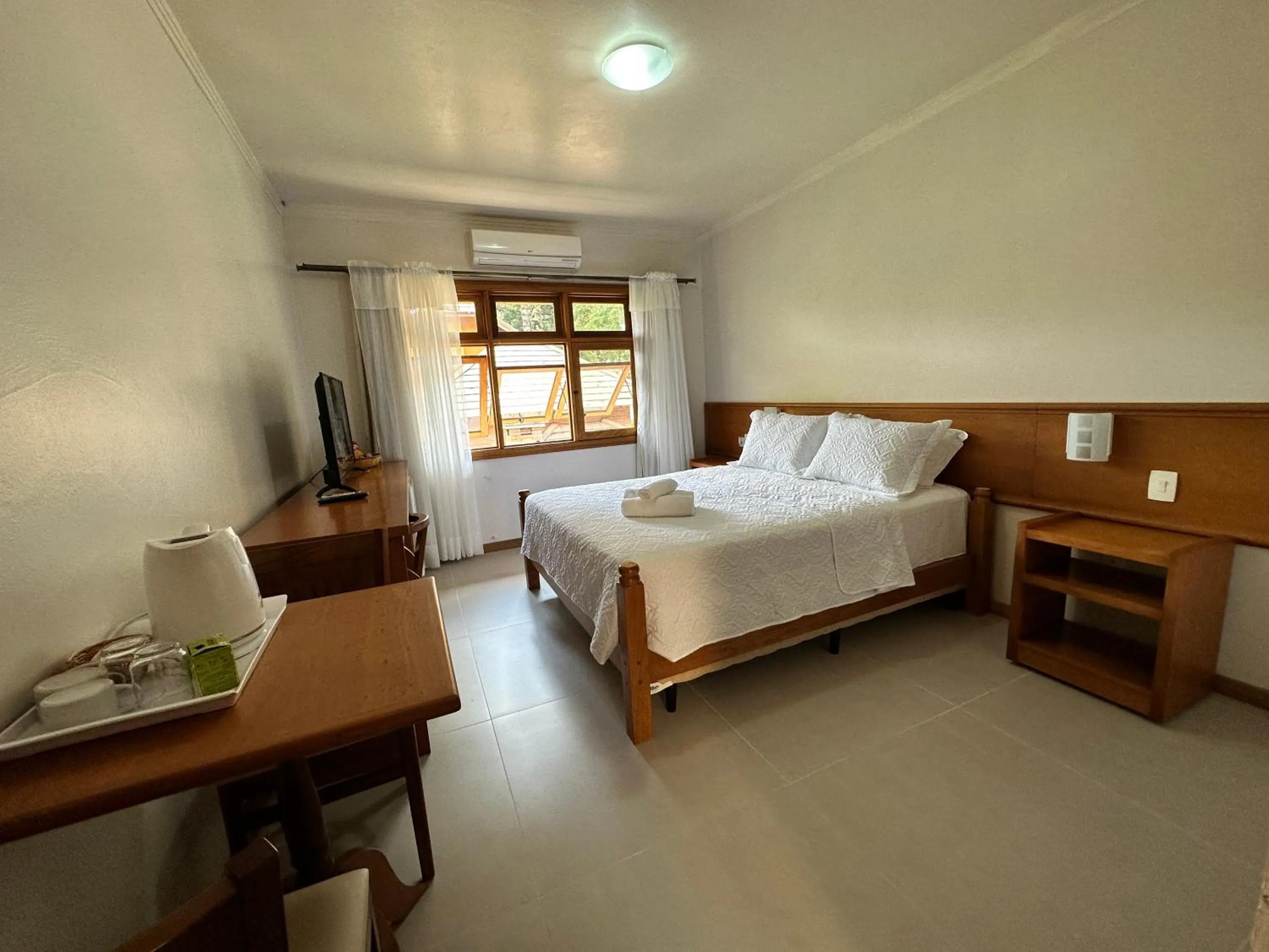 Bed in Pousada Villa Verde