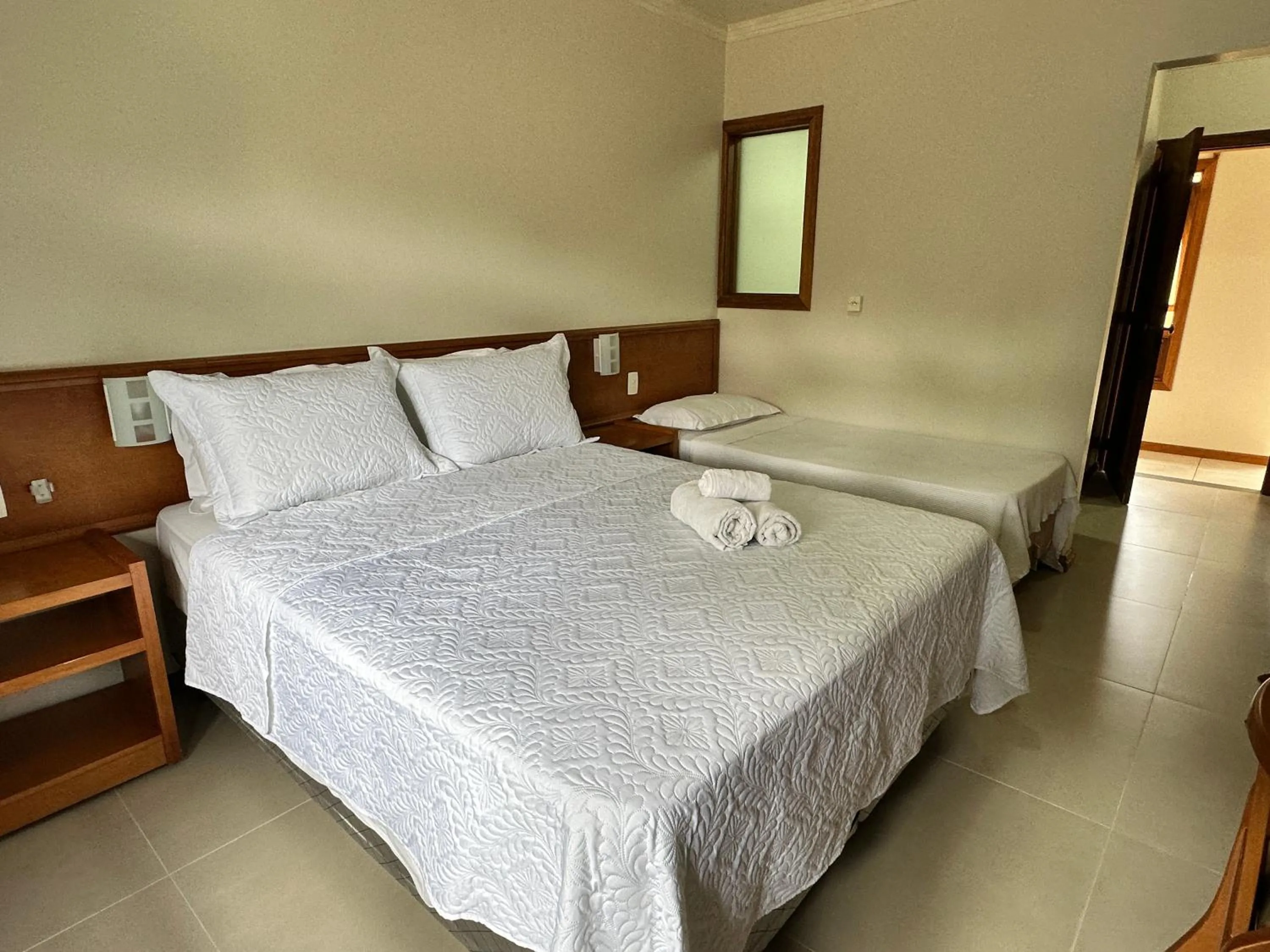 Bed in Pousada Villa Verde