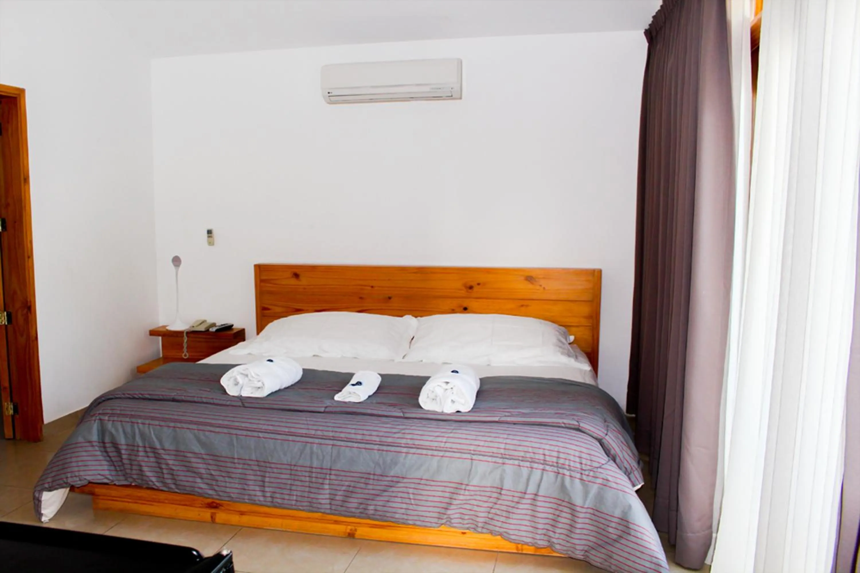 Photo of the whole room, Bed in Hotel Boutique La Angostura