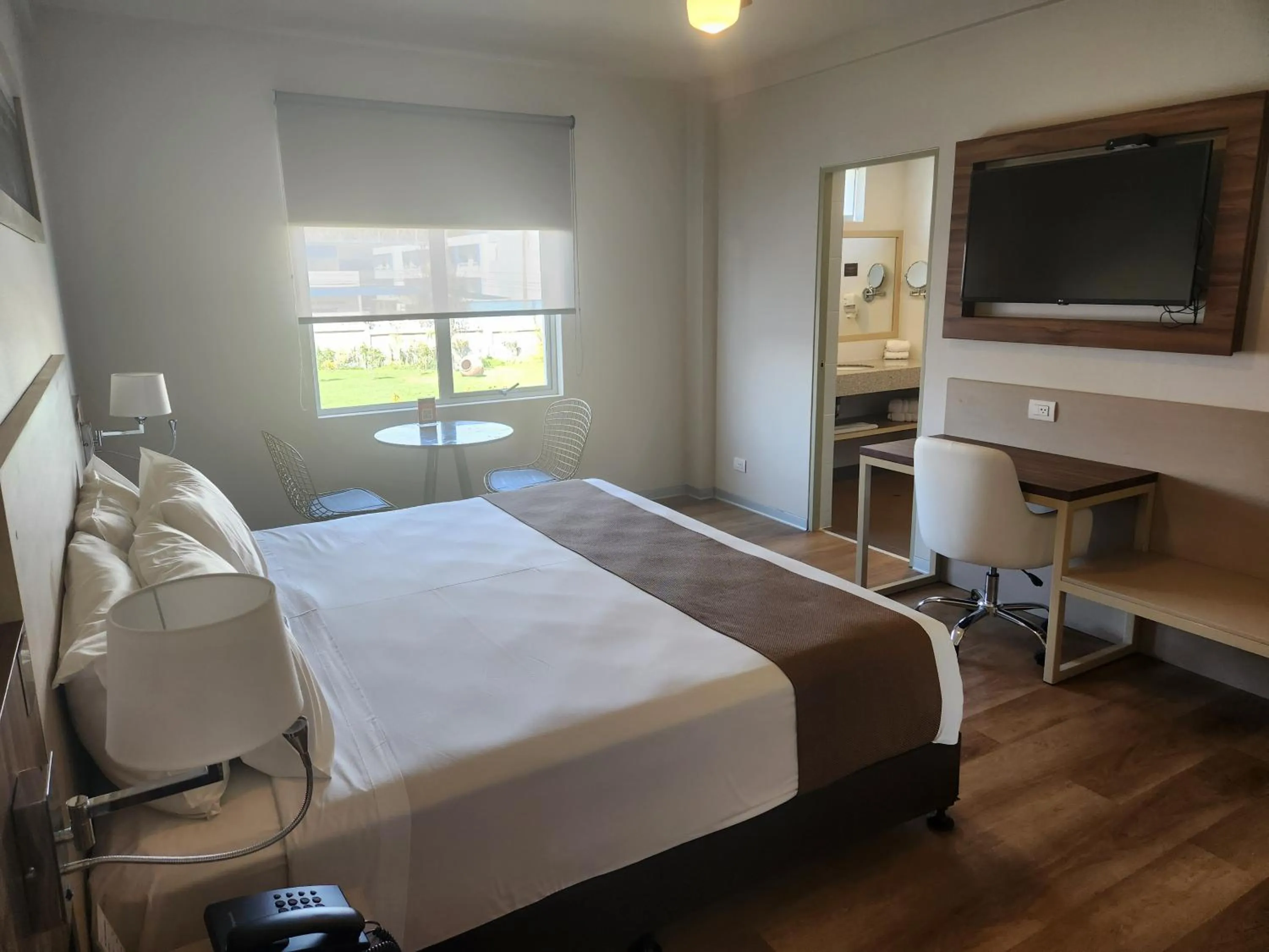 Bedroom, Bed in DM Hoteles Tacna