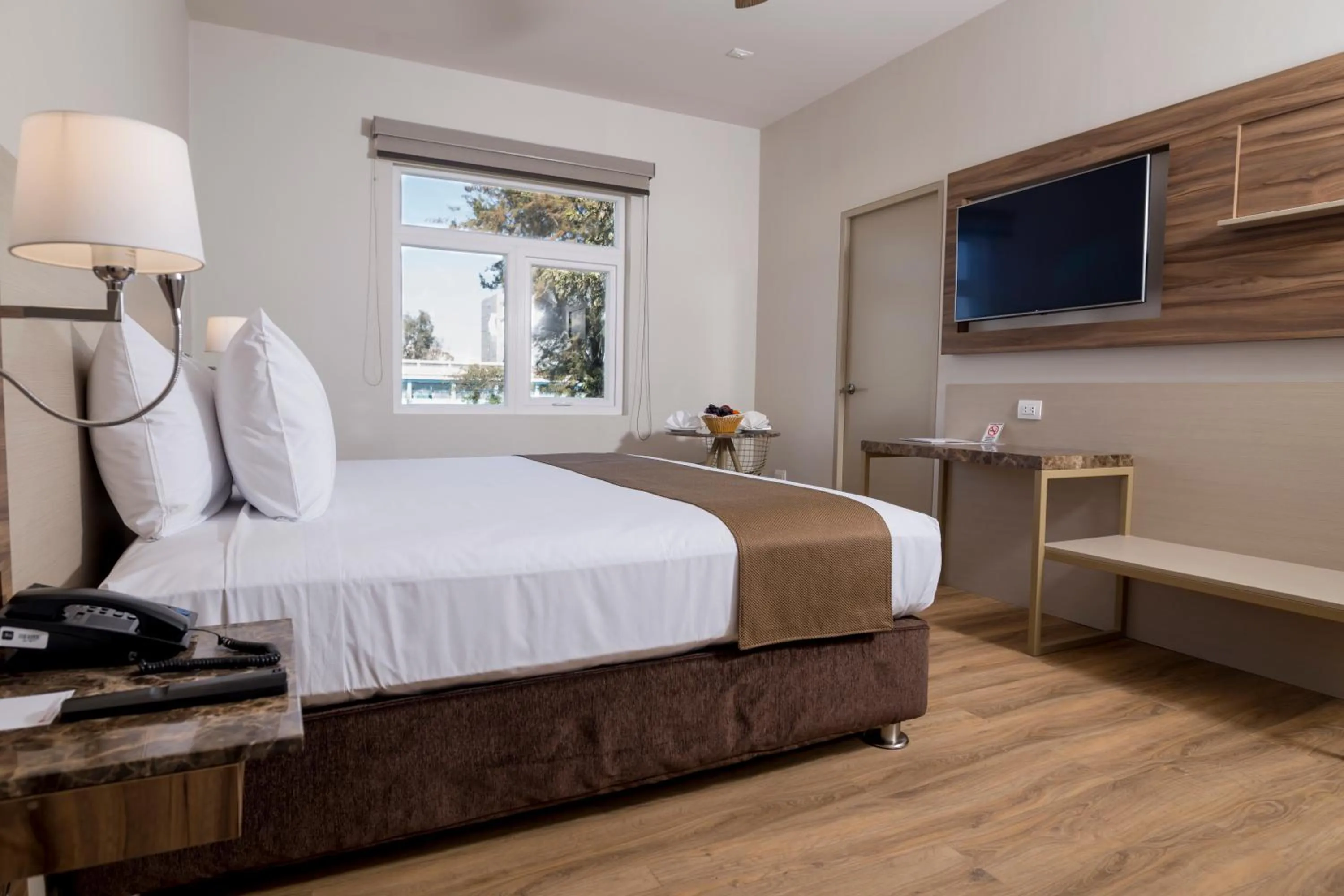 Bedroom, Bed in DM Hoteles Tacna