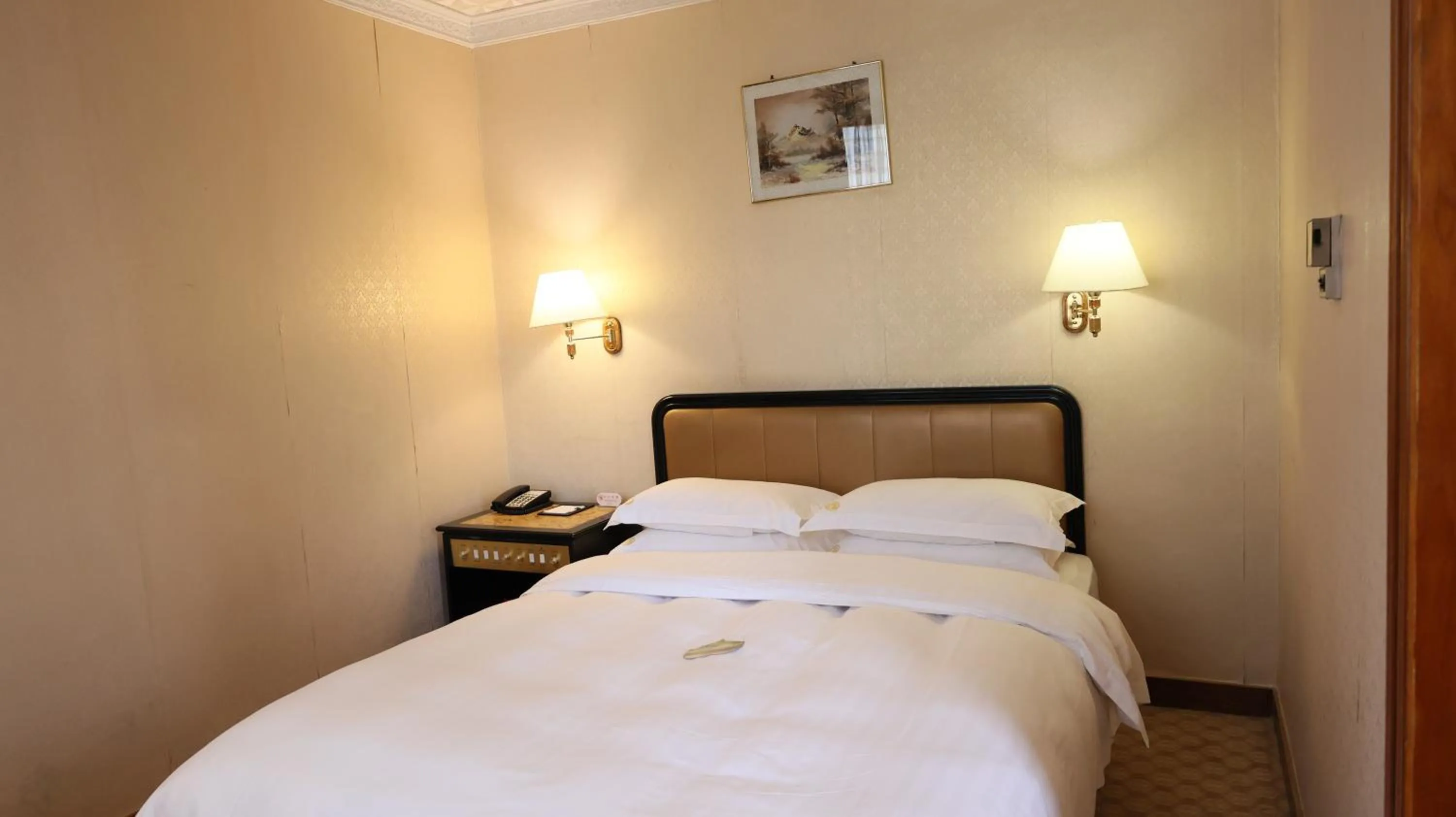 Bed in Guangzhou Aiqun Hotel - Canton Fair Free Shuttle Bus during Canton Fair period