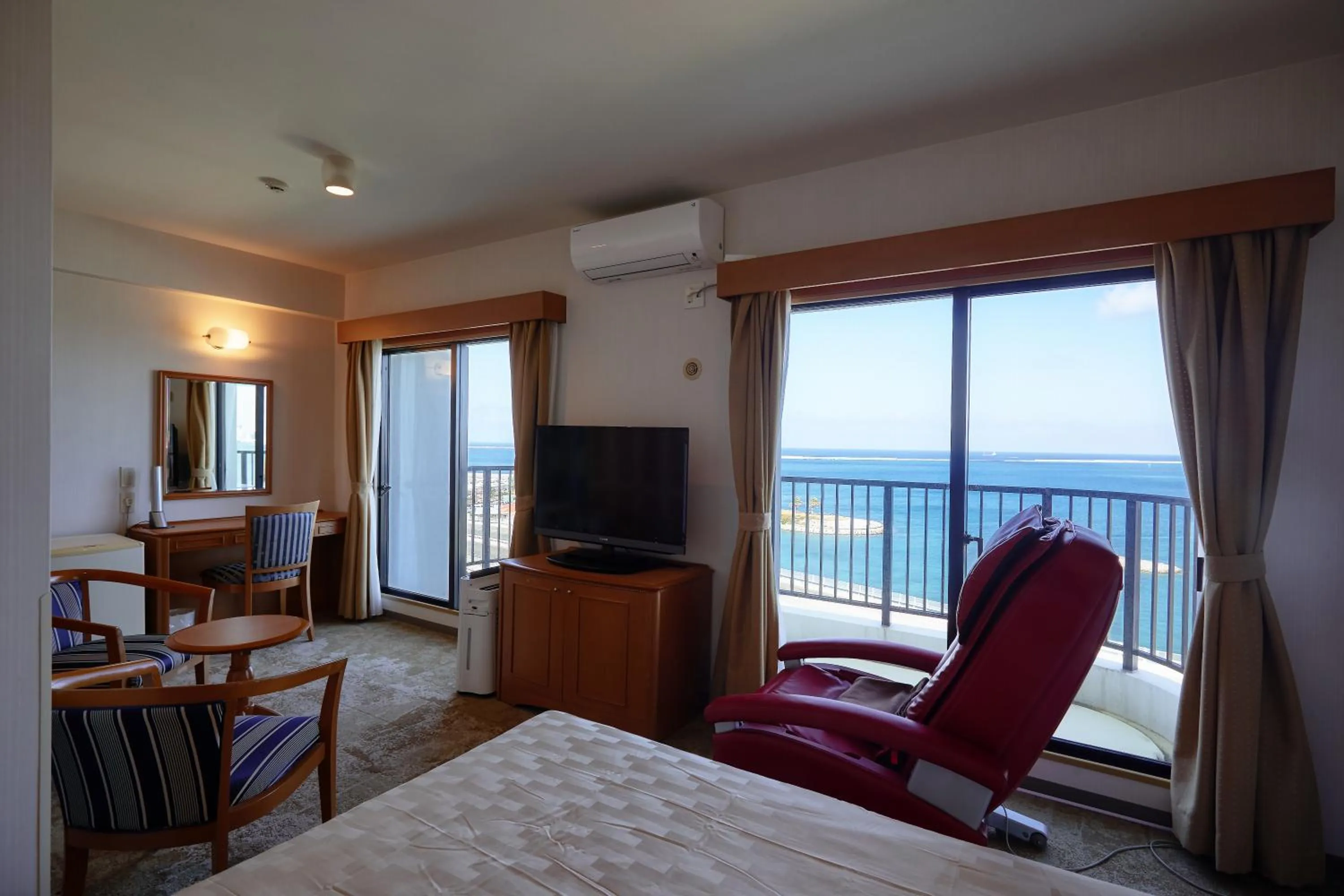 Photo of the whole room, Bed in Naha Beach Side Hotel