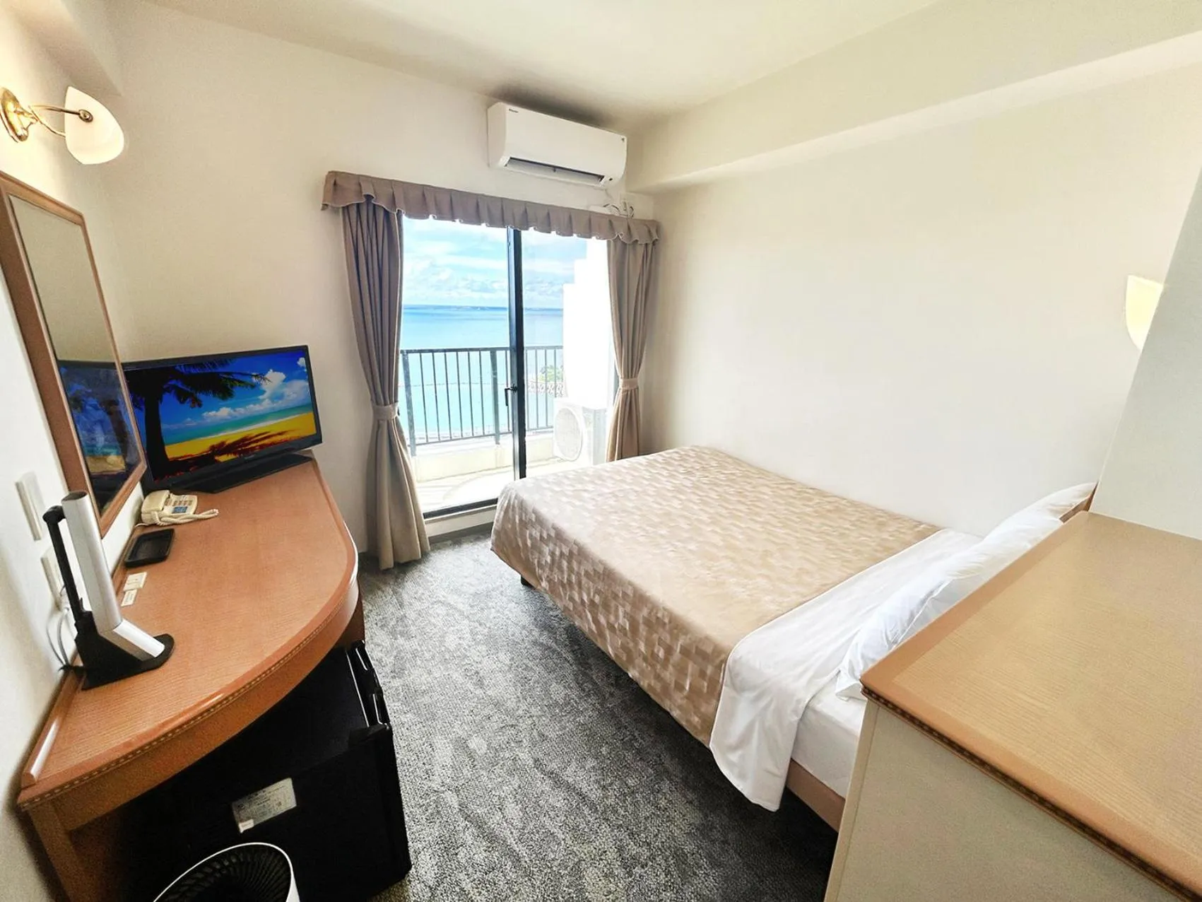 Bed in Naha Beach Side Hotel