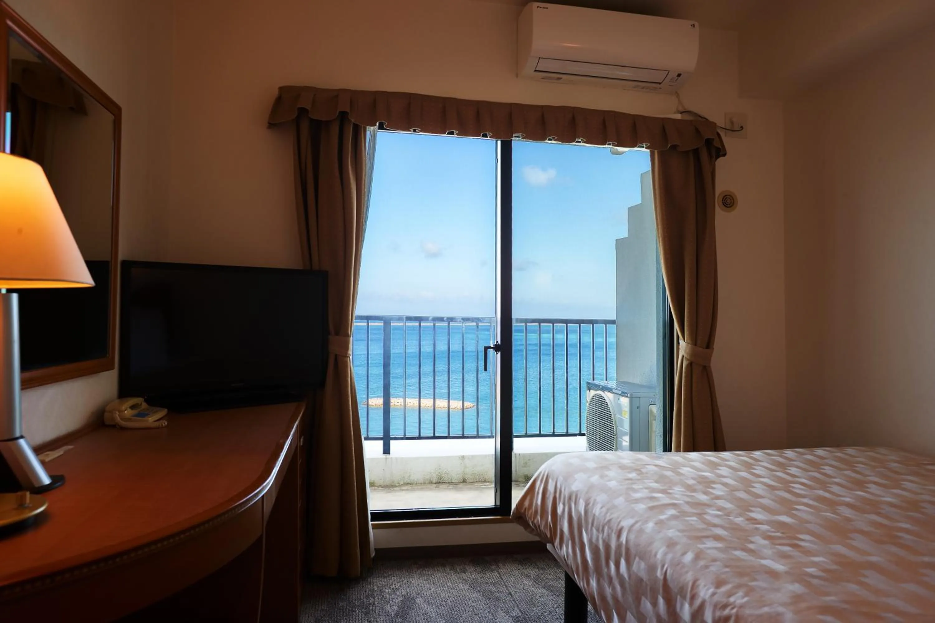 View (from property/room), Bed in Naha Beach Side Hotel