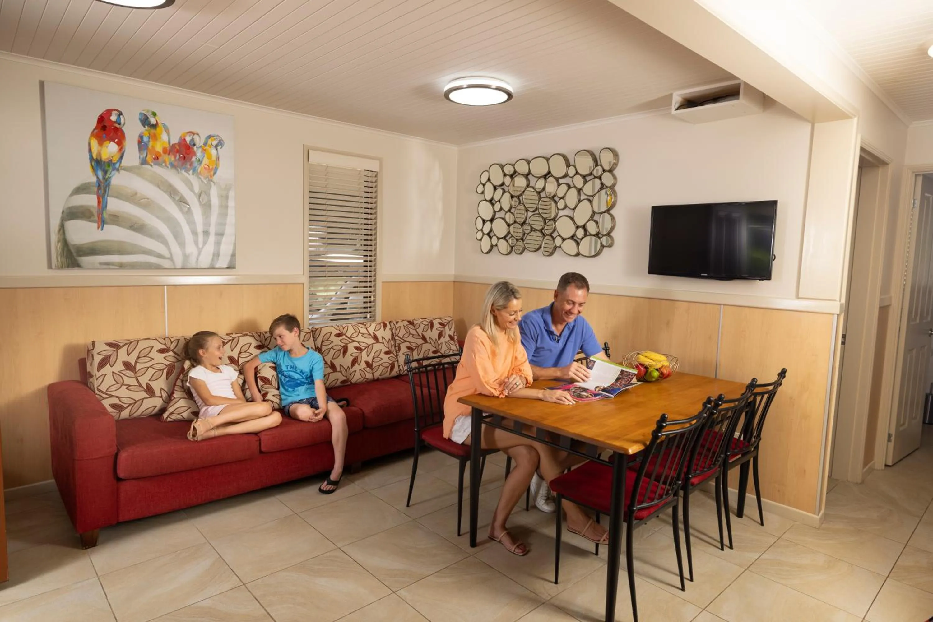 Living room in Ashmore Palms Holiday Village
