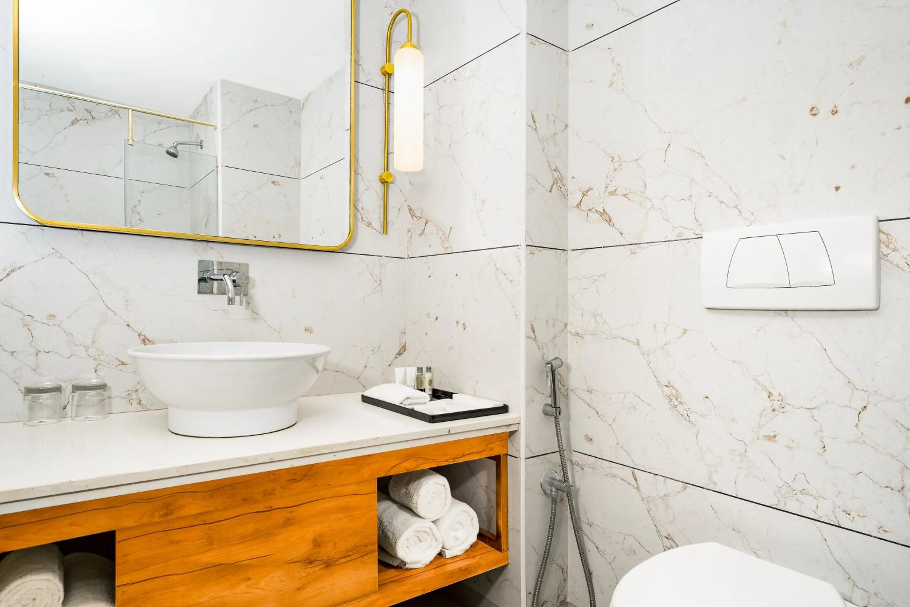 Toilet in DoubleTree by Hilton Hotel Goa - Arpora - Baga