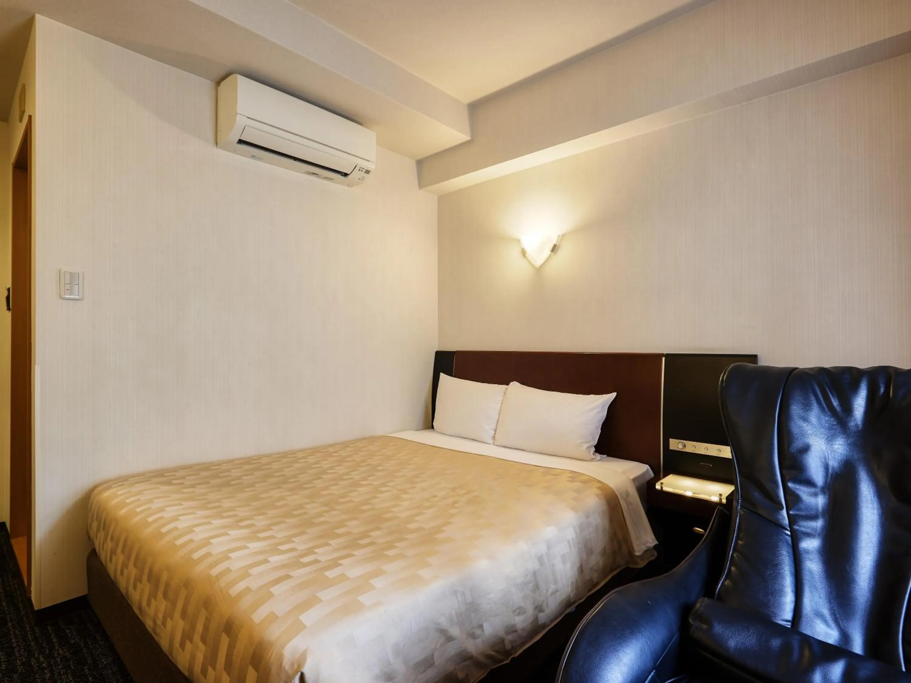 Photo of the whole room, Bed in Hotel Blion Naha